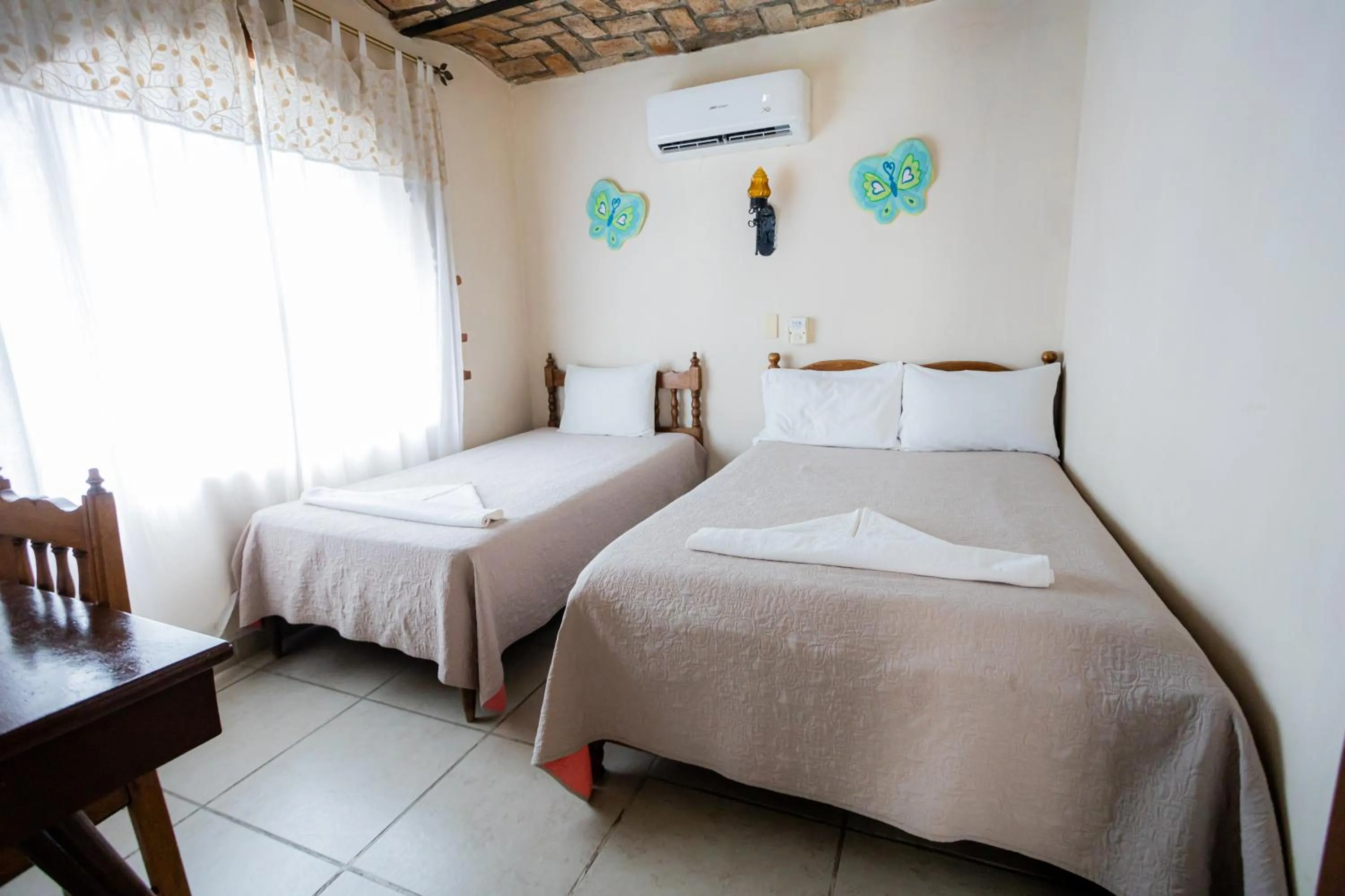 Bed in Bungalows Maria Teresa