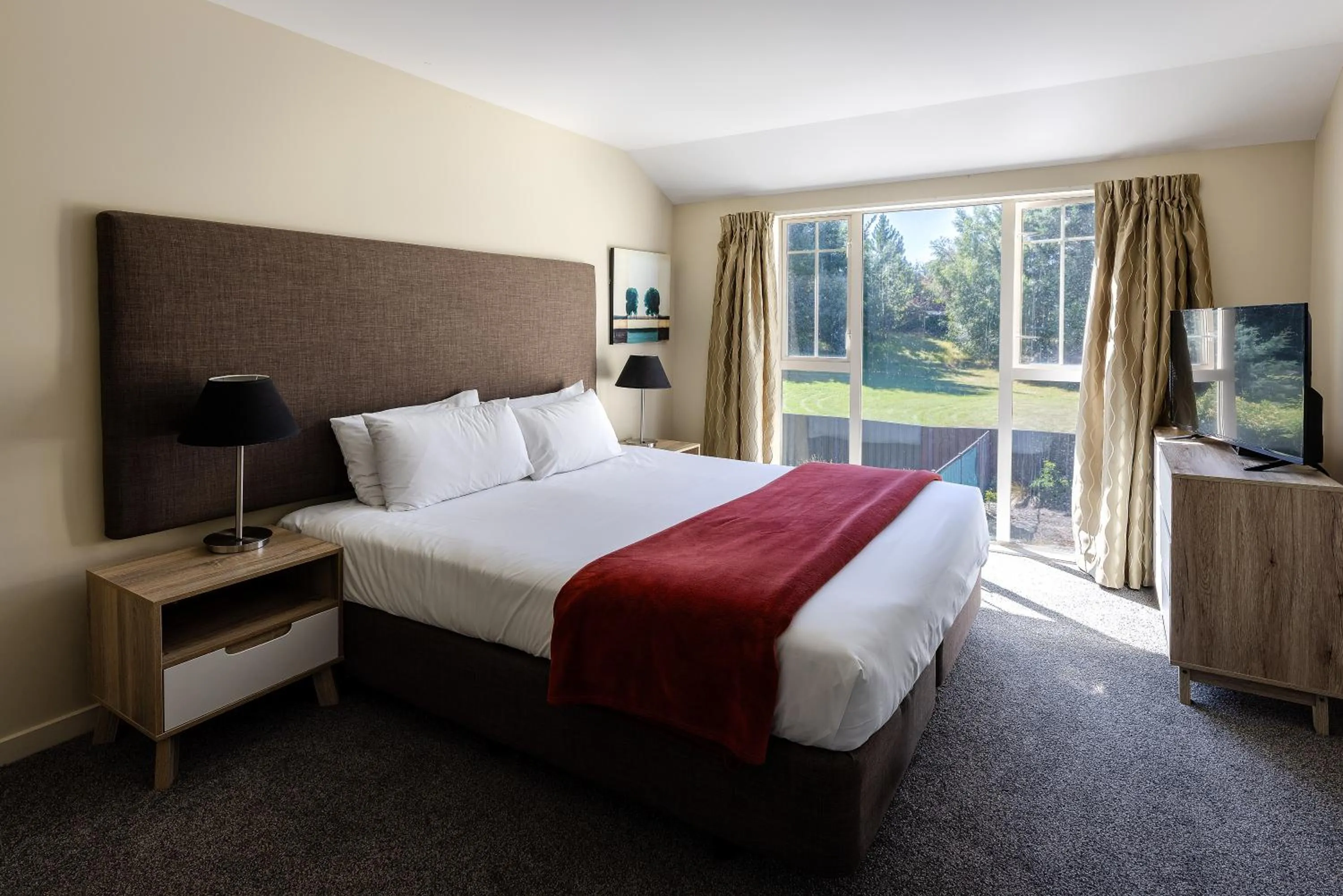 Bed in Mantra Lake Tekapo