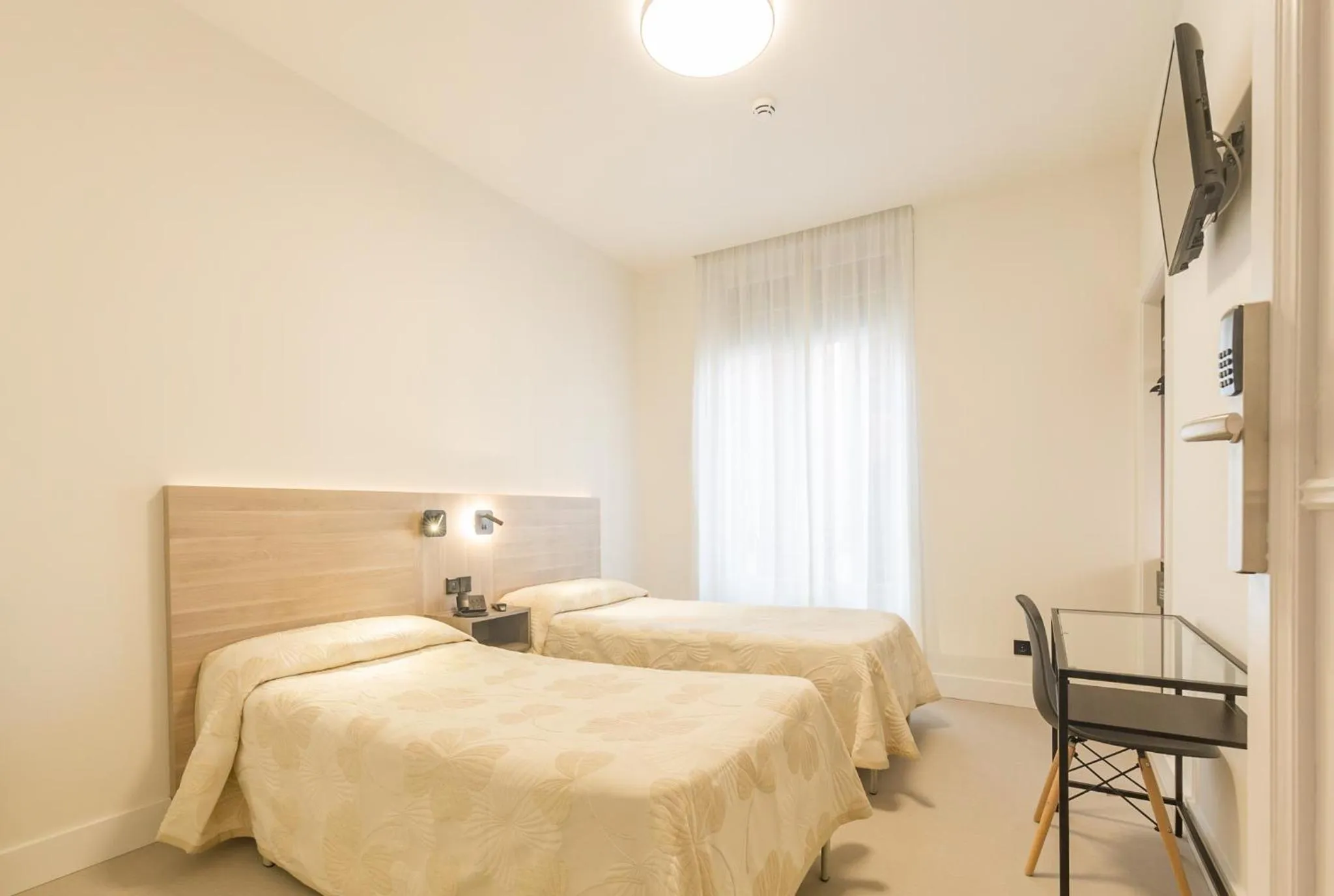 Bed in Hostal Excelsior