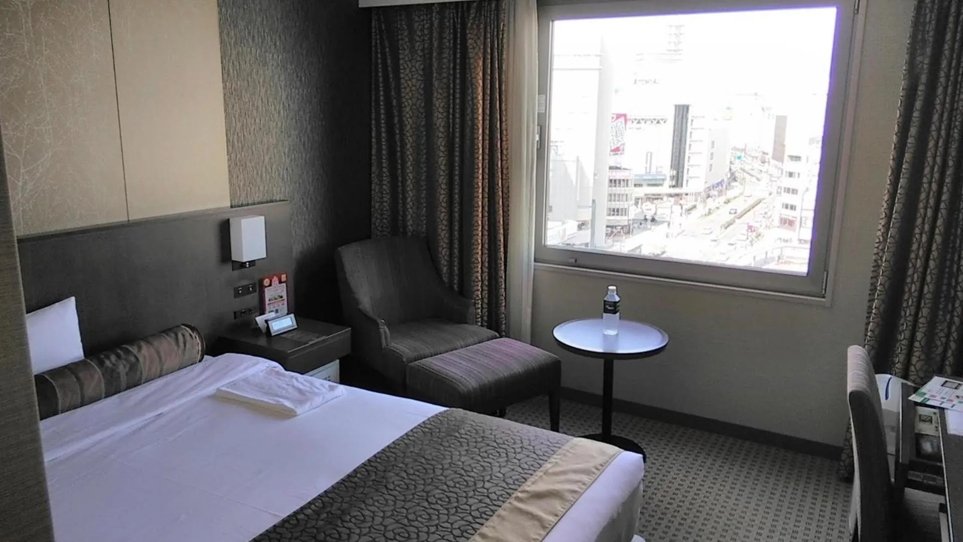 View (from property/room), Bed in Hotel Metropolitan Nagano