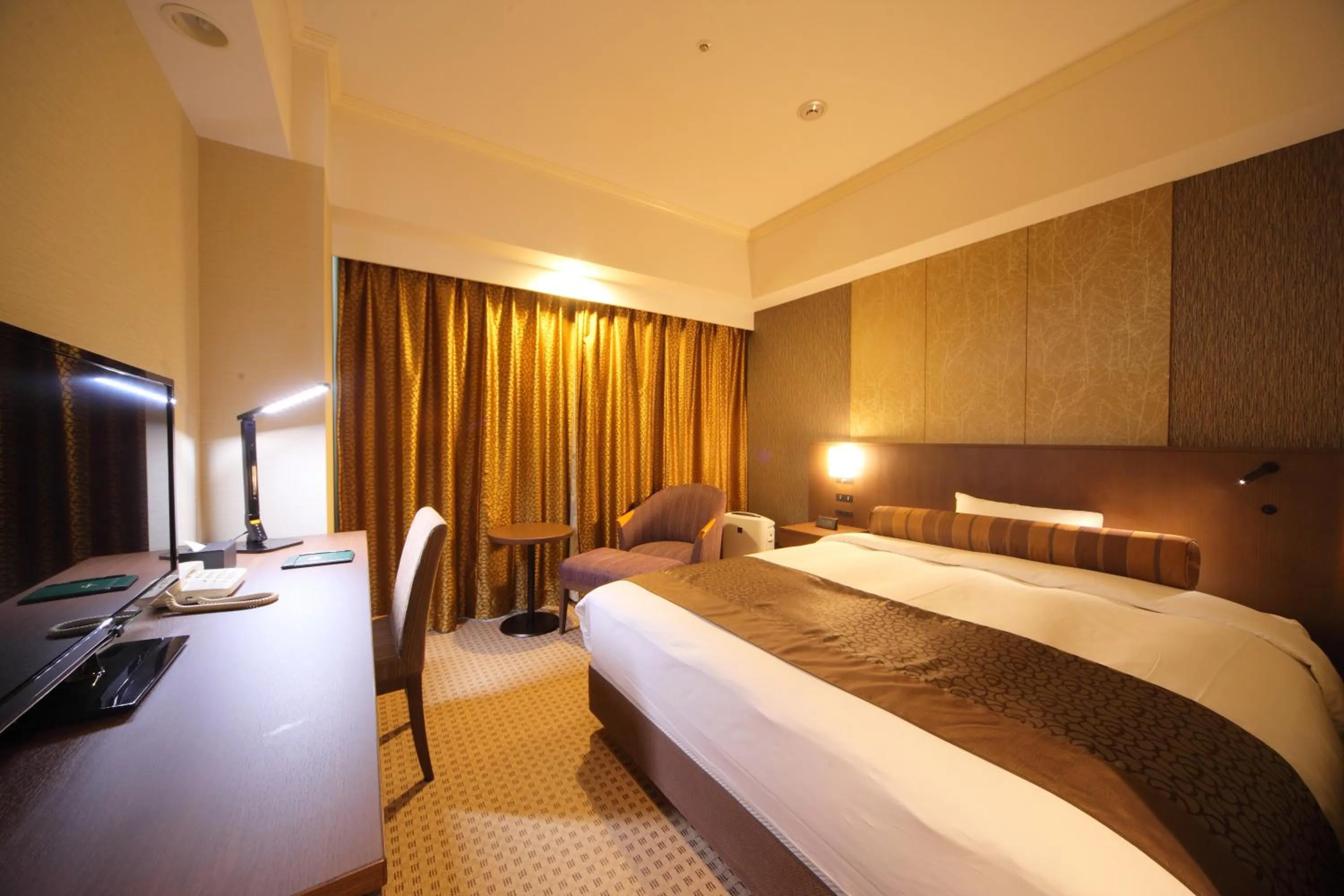 Bed in Hotel Metropolitan Nagano