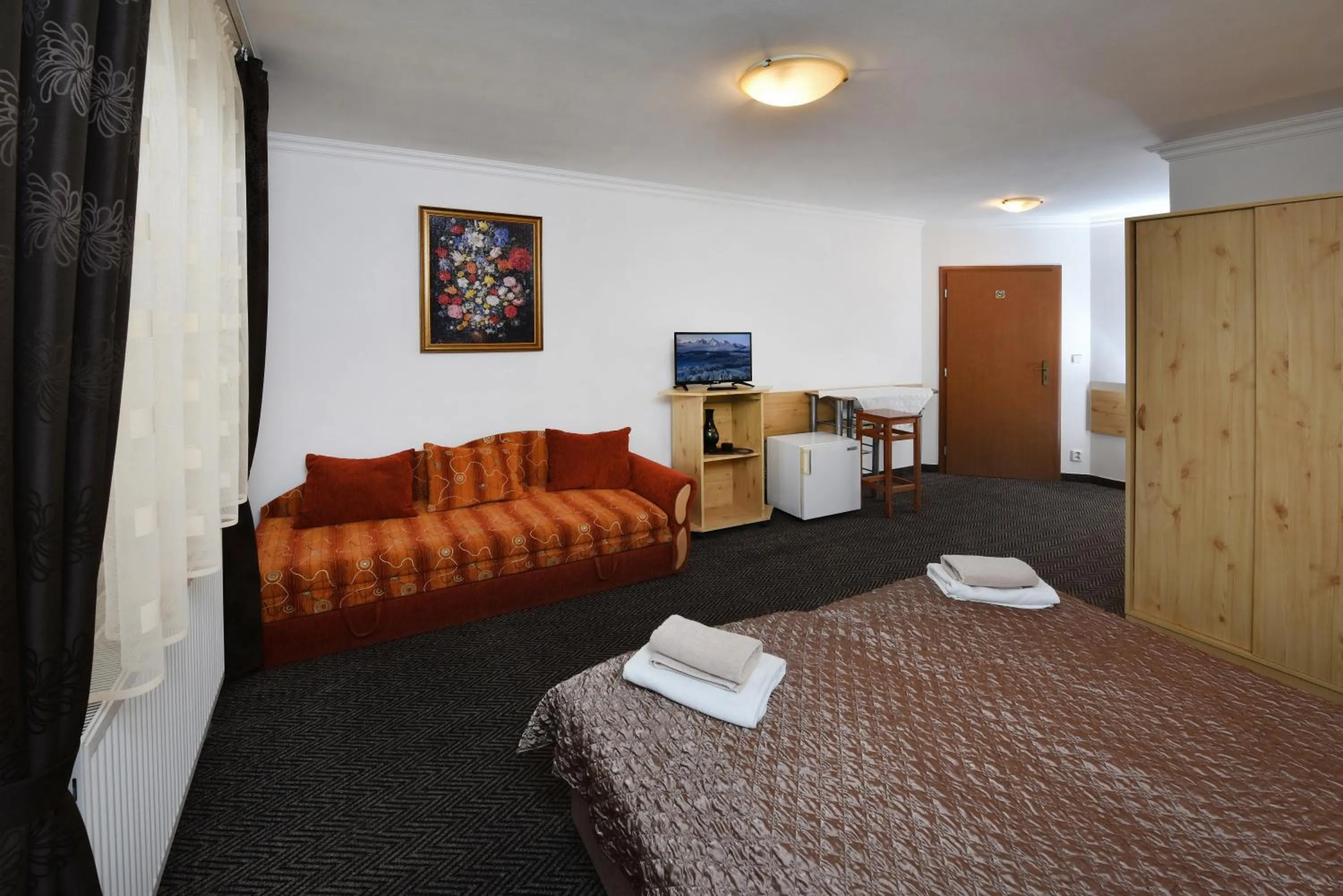 Seating area, Bed in Vila Martina