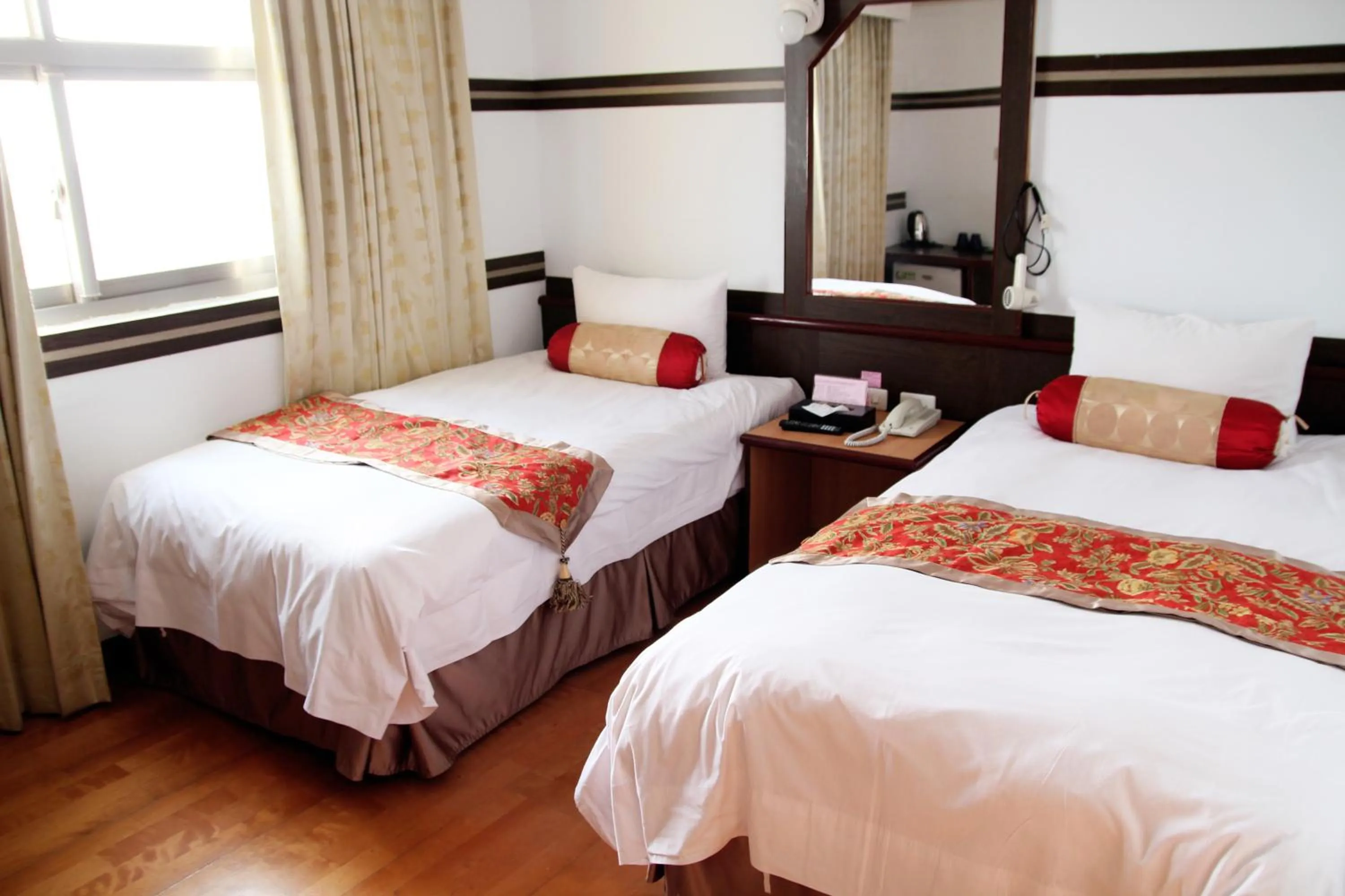 Bed in Sheng-Kuo Hotel