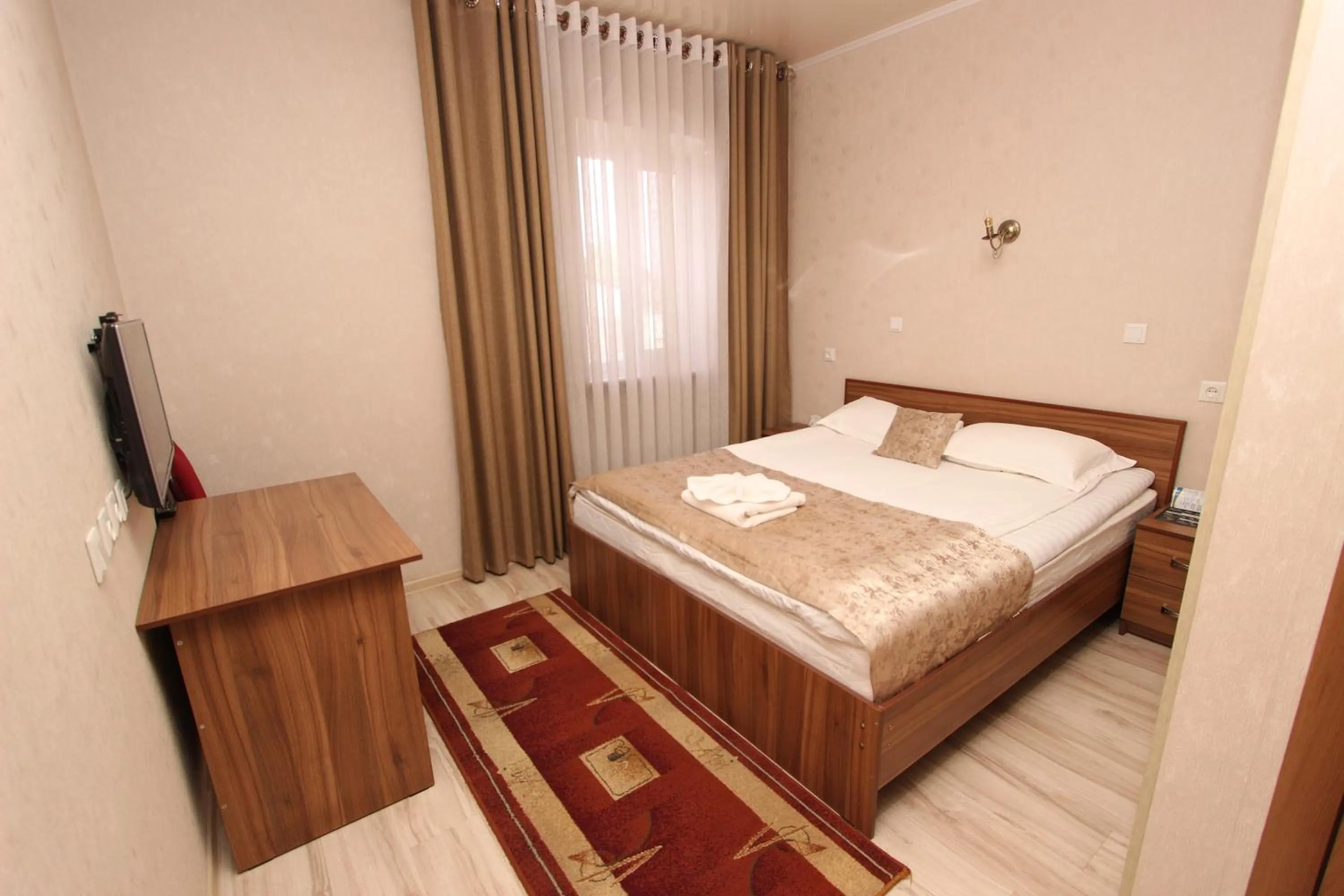 Bed in Madanur Hotel