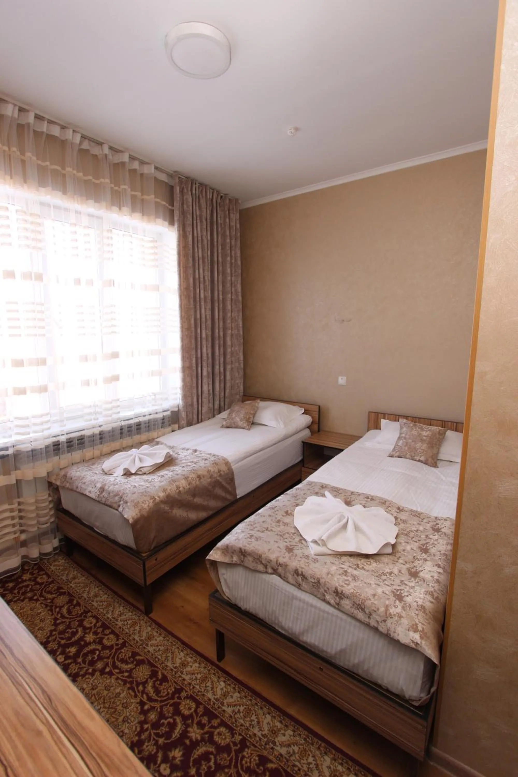 Photo of the whole room, Bed in Madanur Hotel