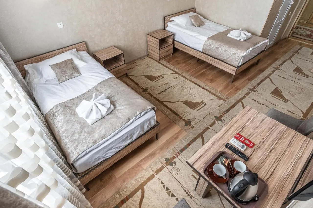 Bed in Madanur Hotel