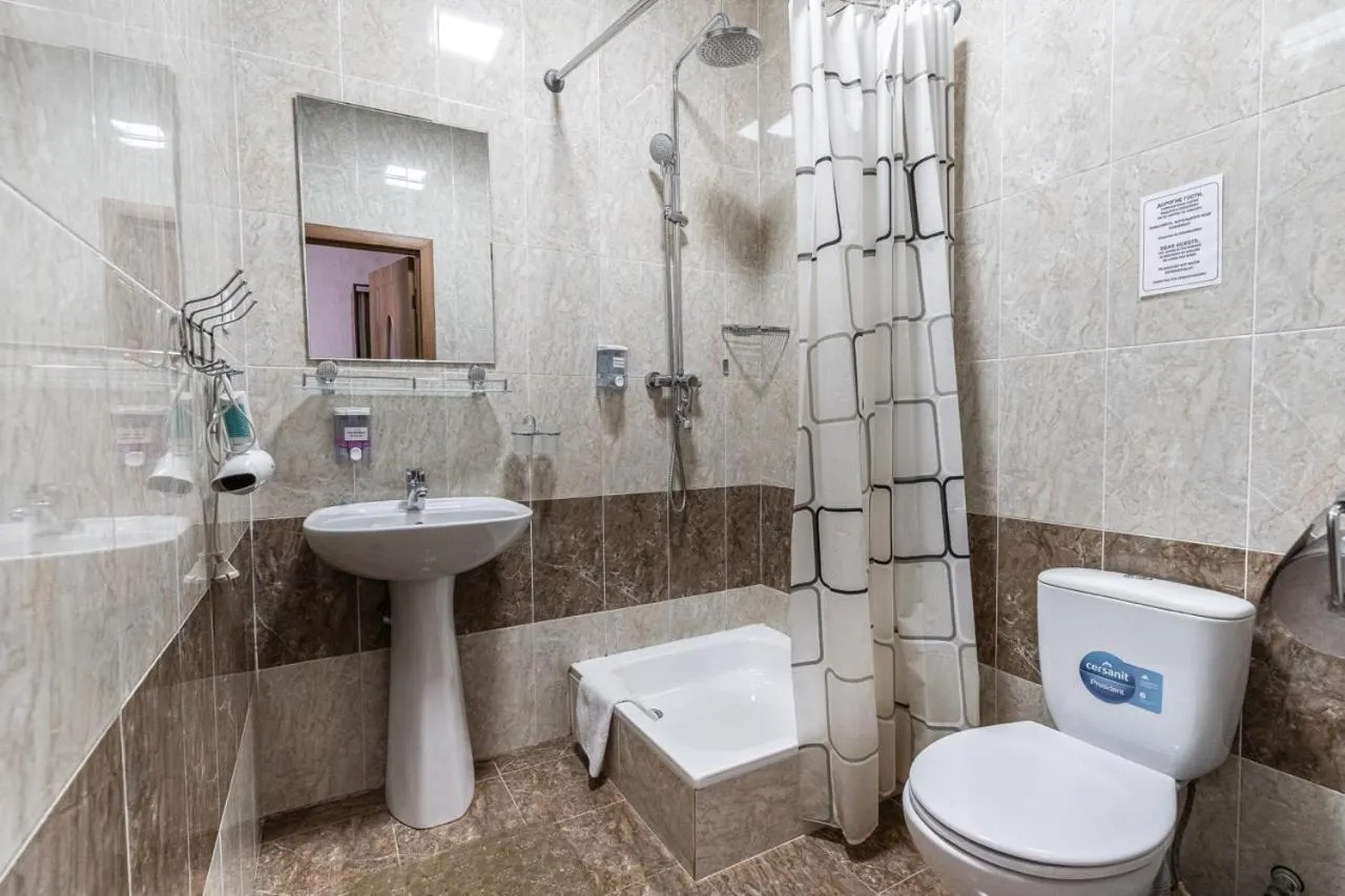 Bathroom in Madanur Hotel