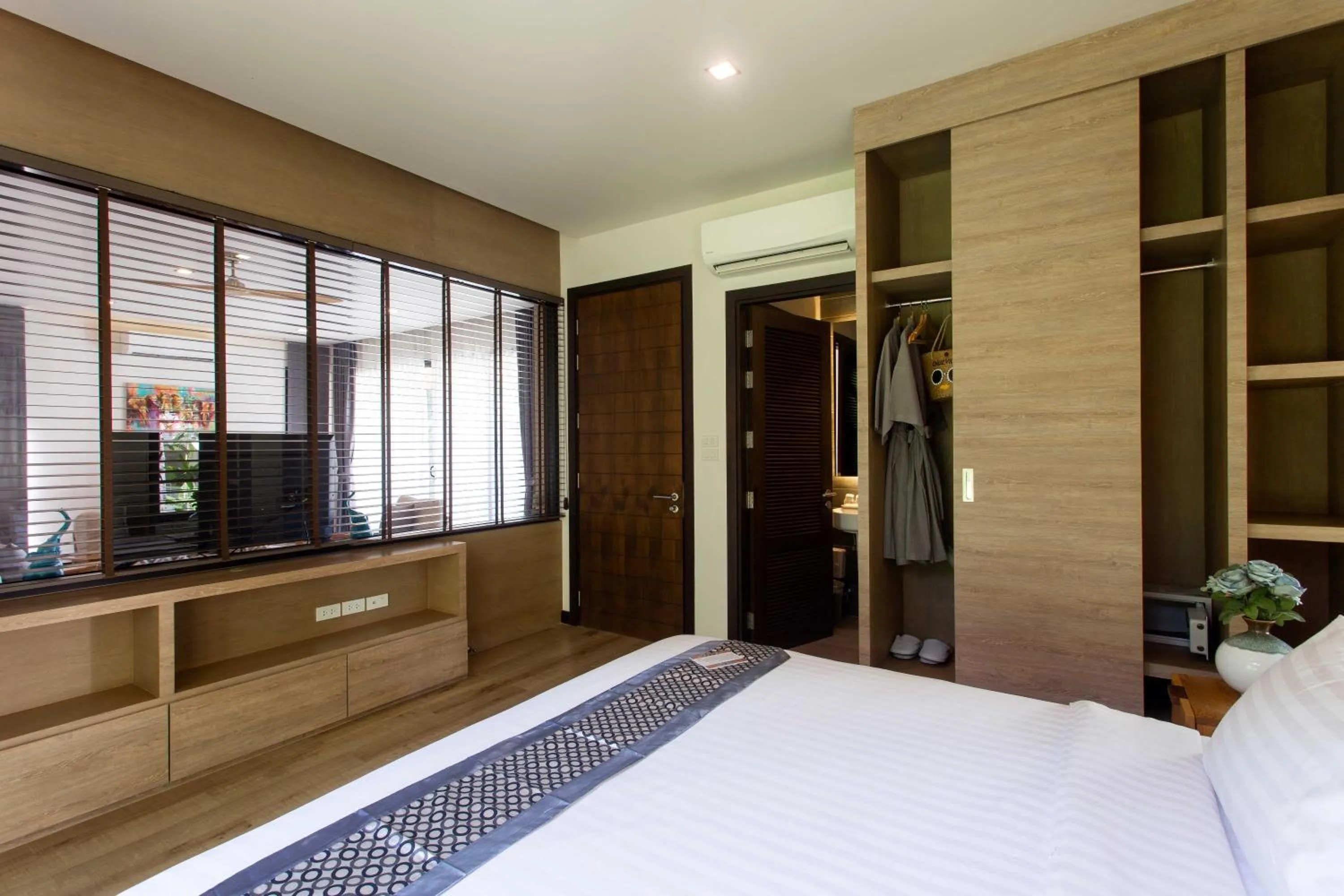 Bed in CHUZ Villas Samui SHA Plus