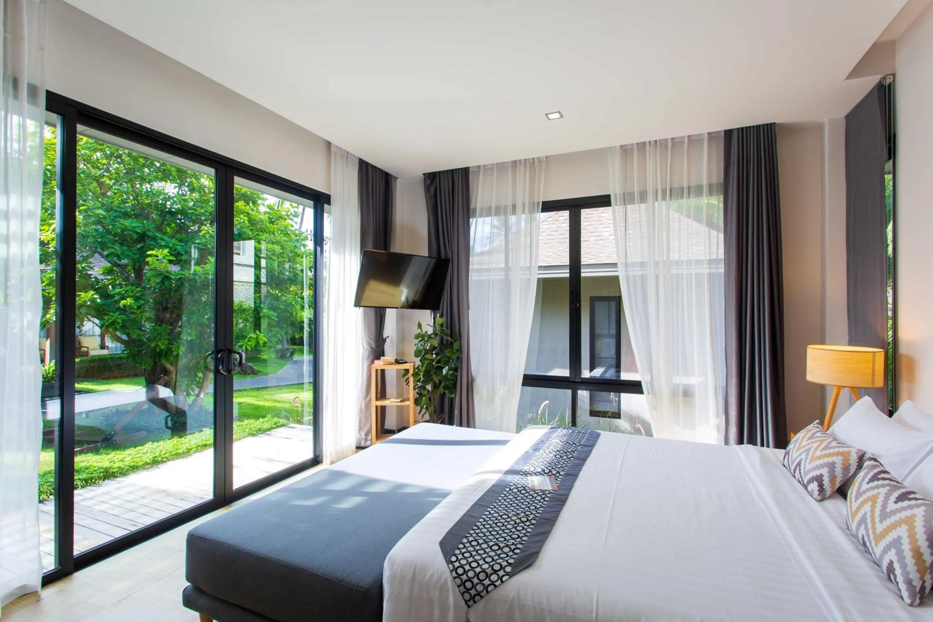 Bed in CHUZ Villas Samui SHA Plus