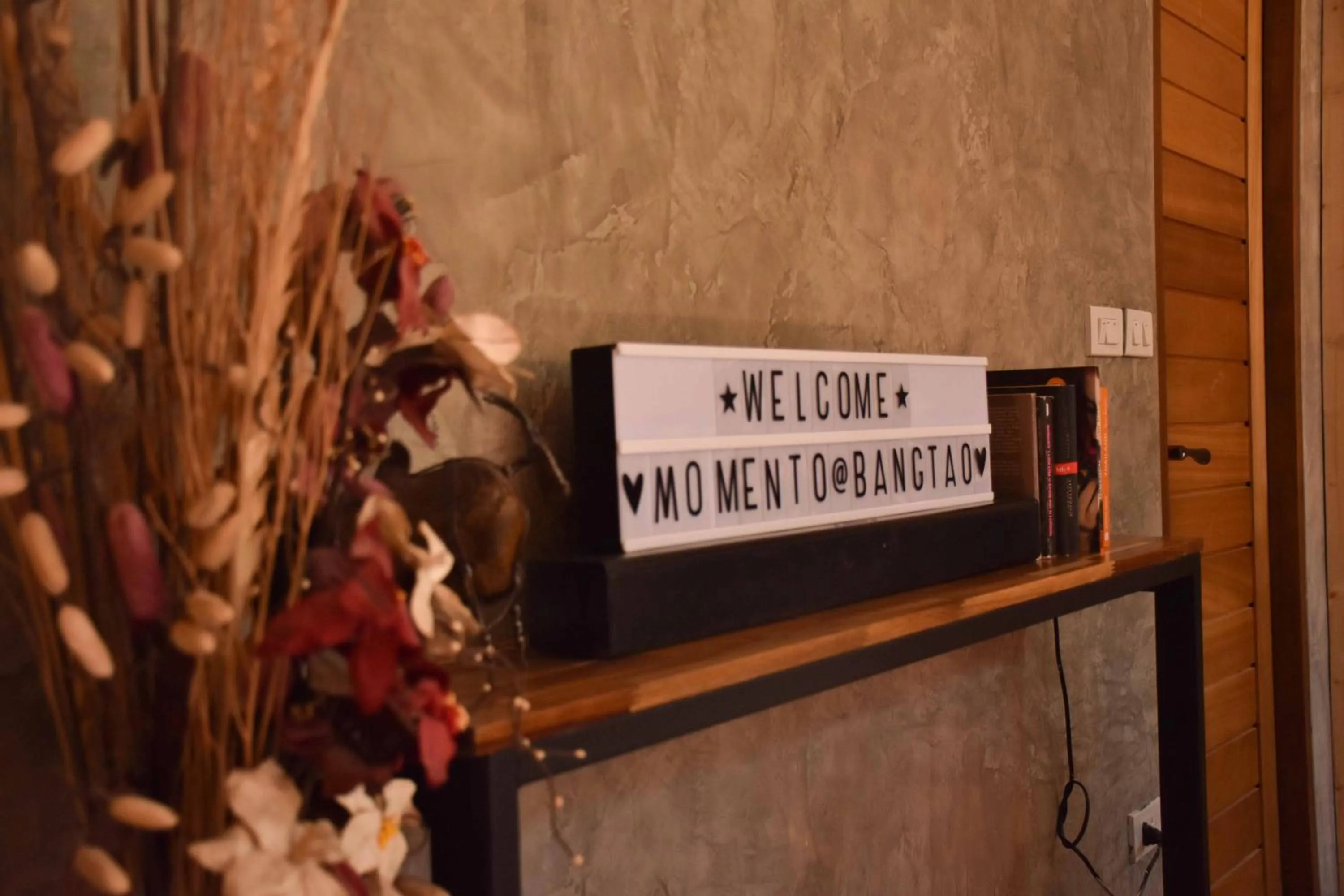 Property logo or sign in Momento Bangtao Beach