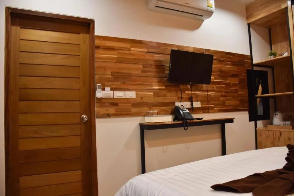 Bed in Momento Bangtao Beach