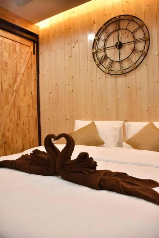 Bed in Momento Bangtao Beach