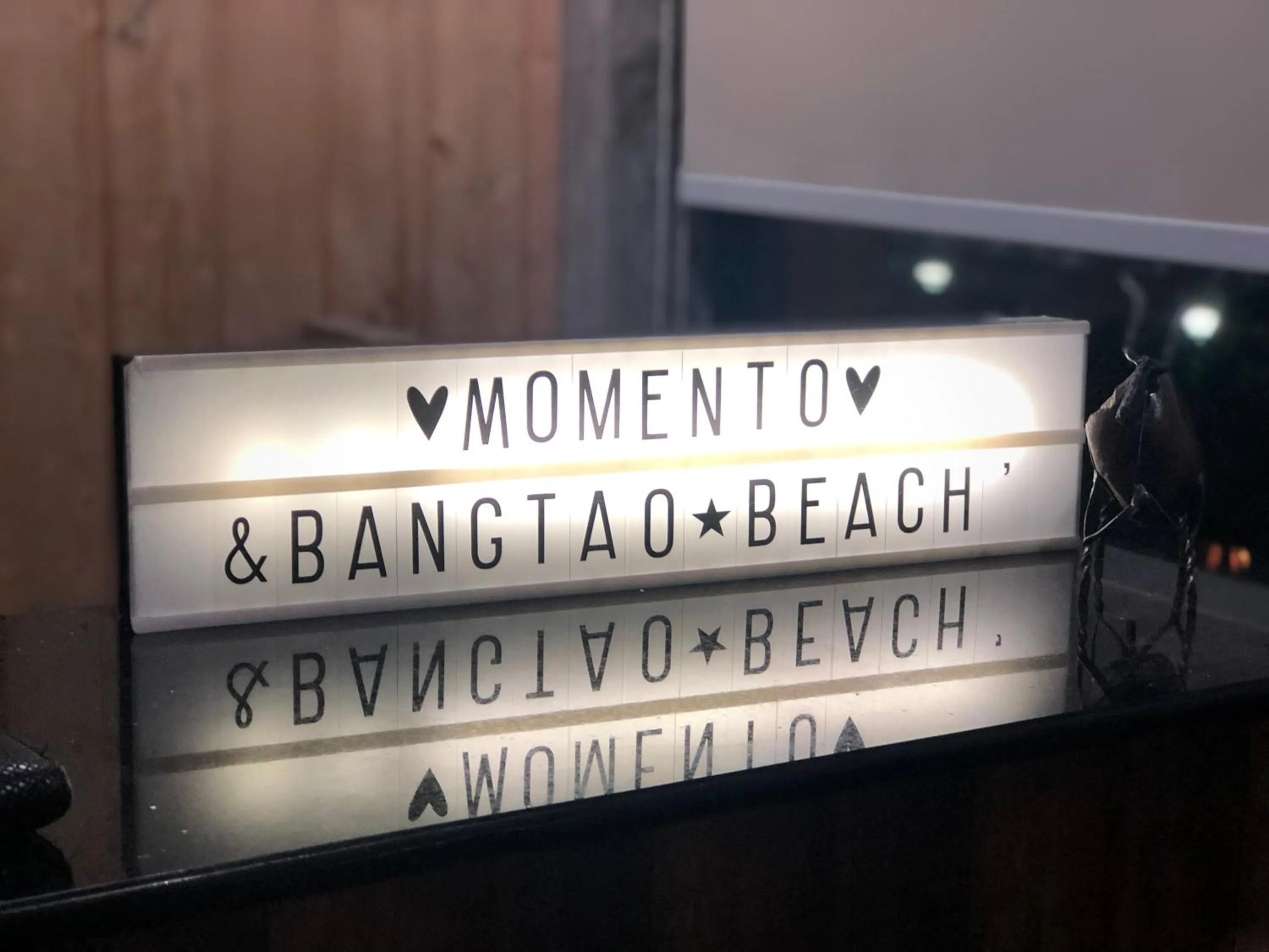 Property logo or sign in Momento Bangtao Beach