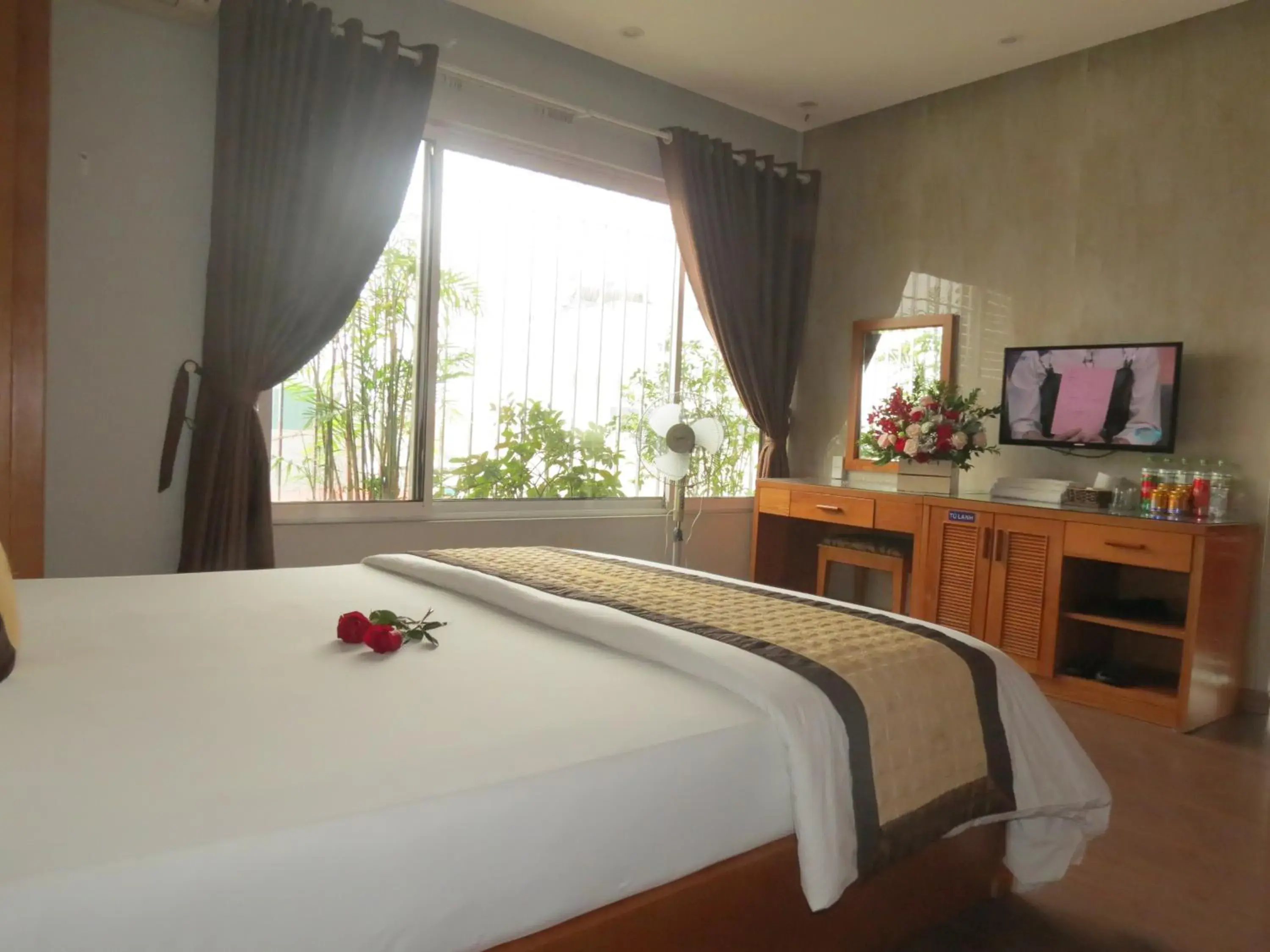 Deluxe Room (2 Adults + 1 Child) in Green Hotel Deluxe Room (2 Adults + 1 Child) in Green Hotel