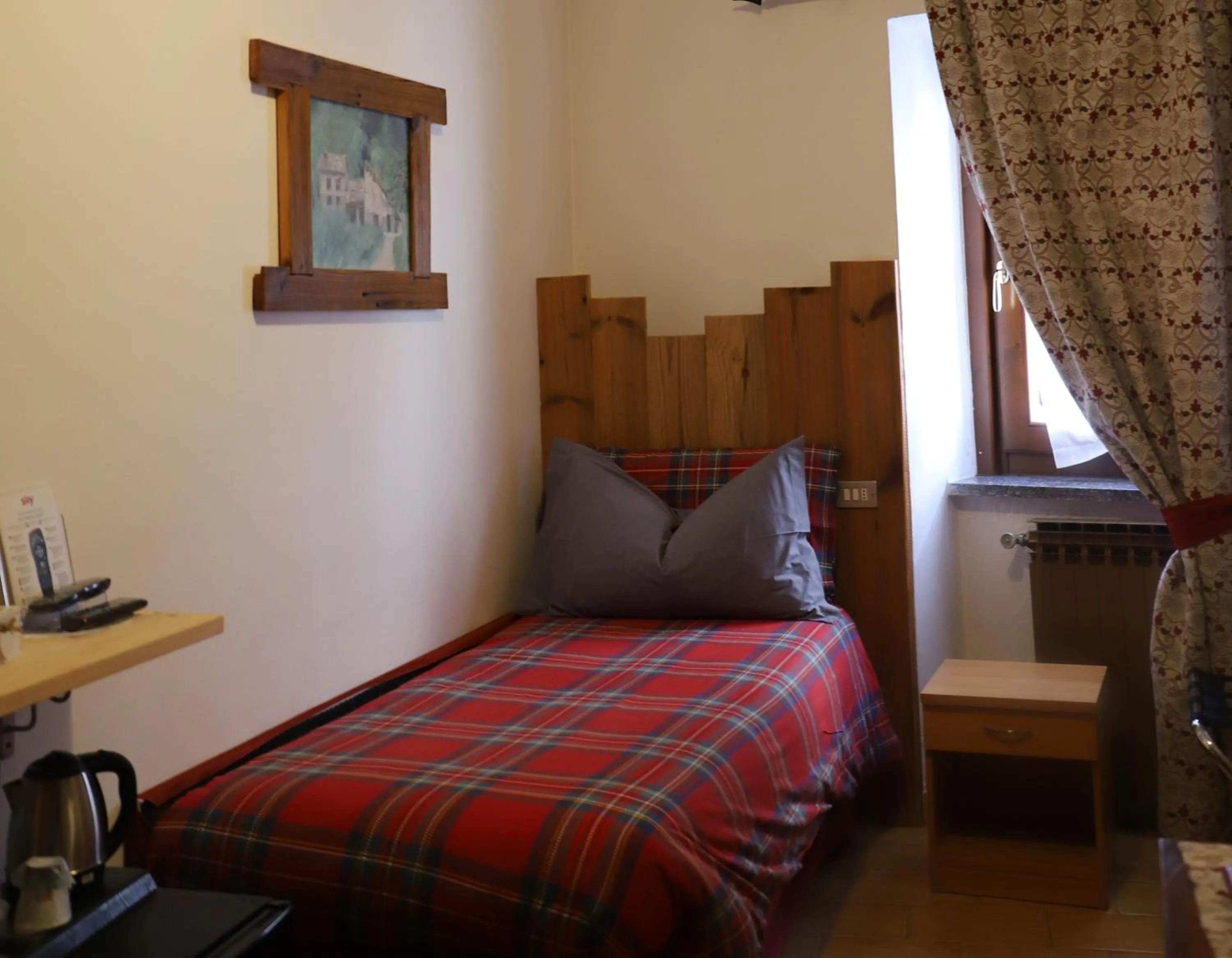 Bed in Hotel Bucaneve