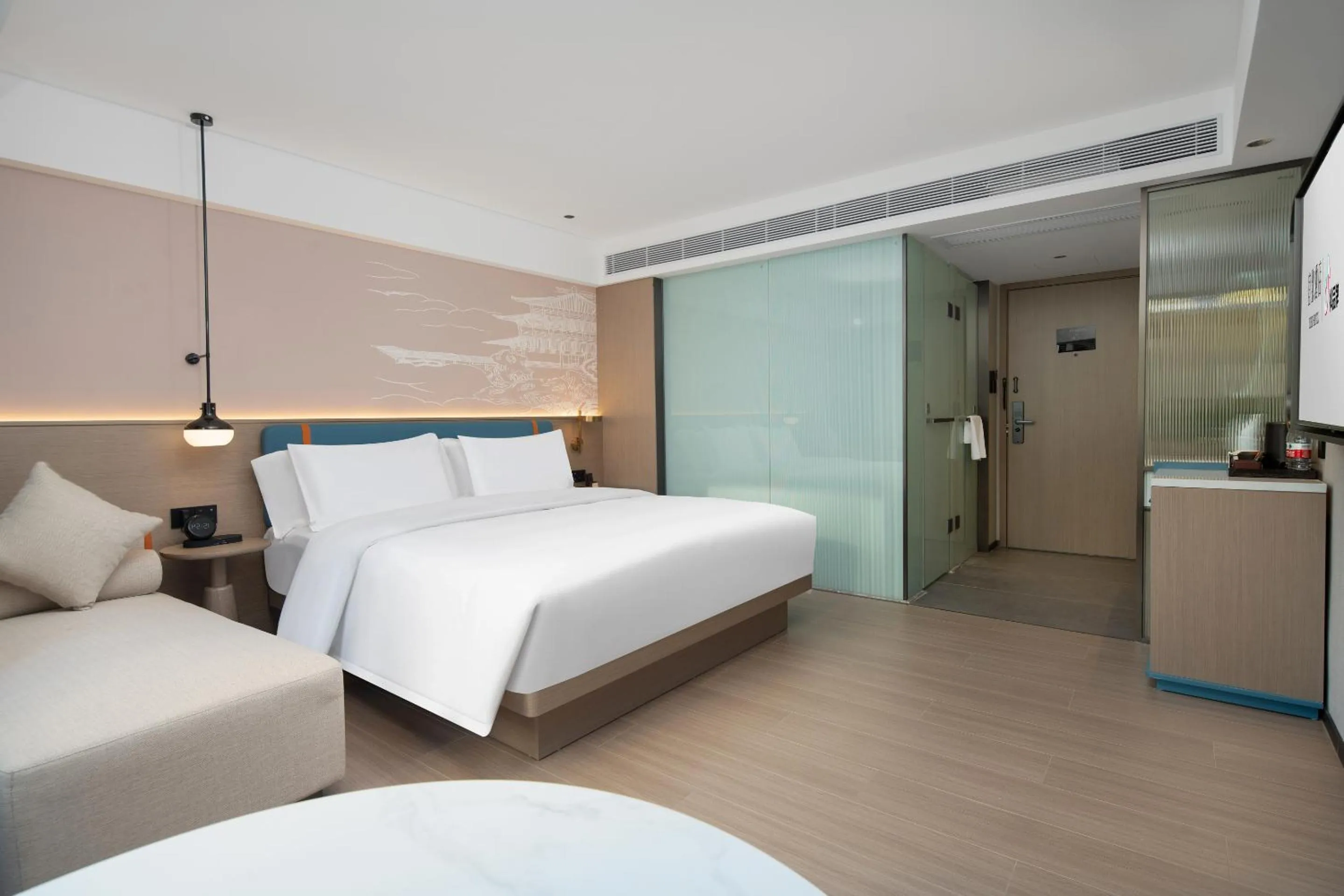 Photo of the whole room, Bed in Yizhi Hotel Changgang Metro Station - Free Shuttle Bus during Canton Fair
