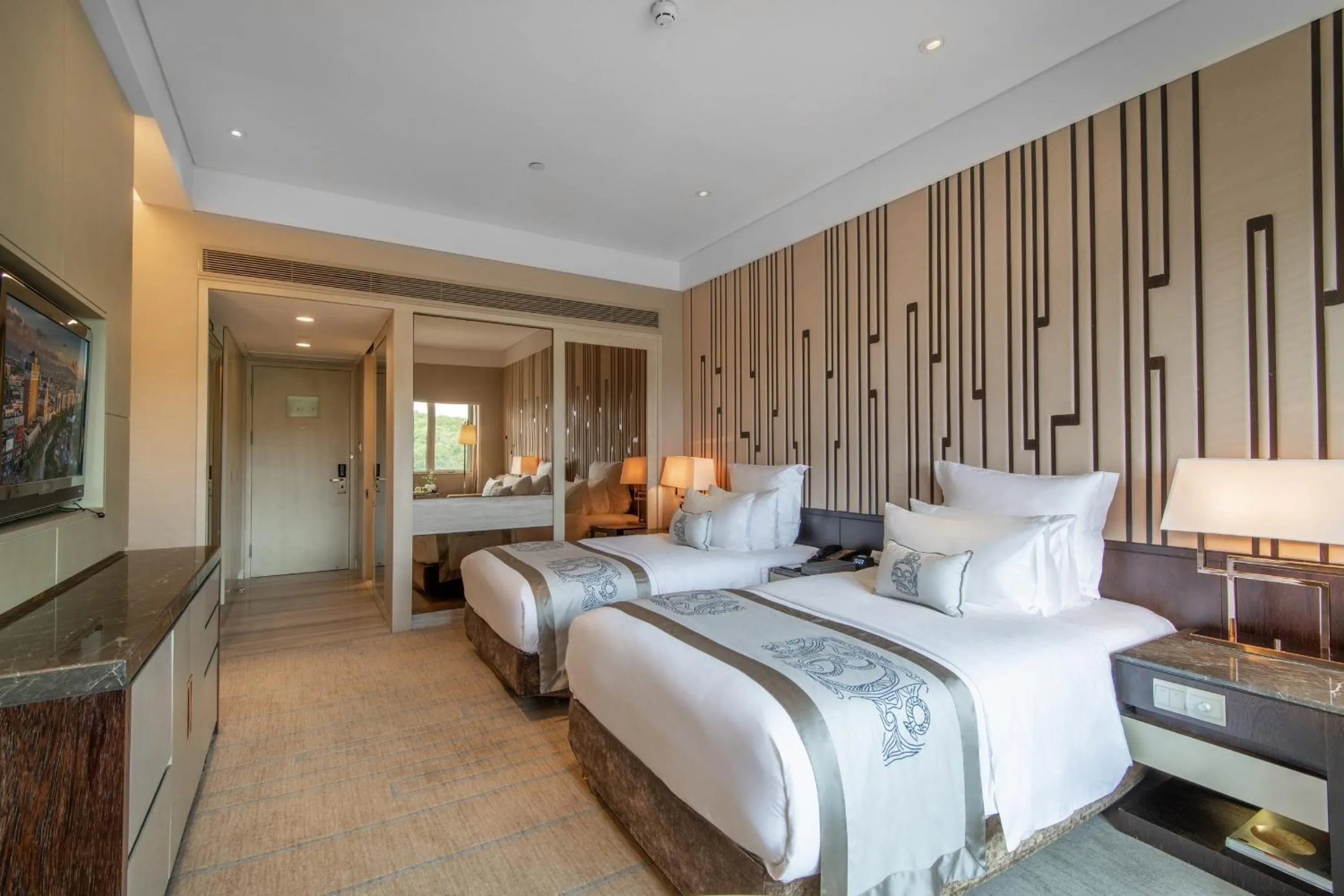 Bed in Grand Pacific Hotel Ningbo