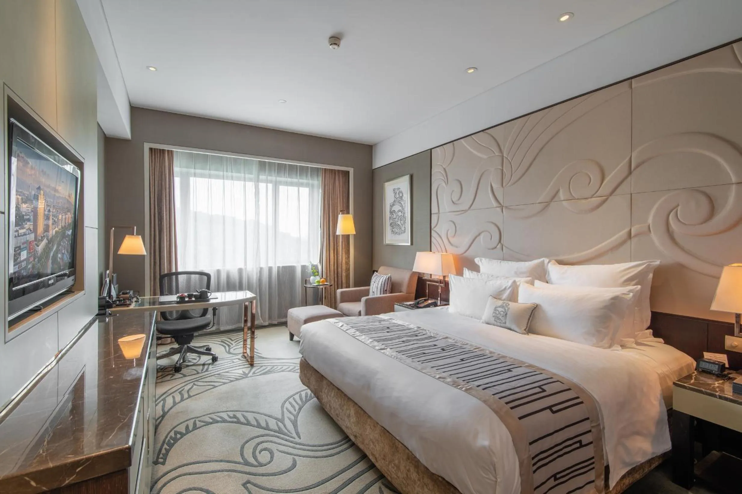 Bed in Grand Pacific Hotel Ningbo