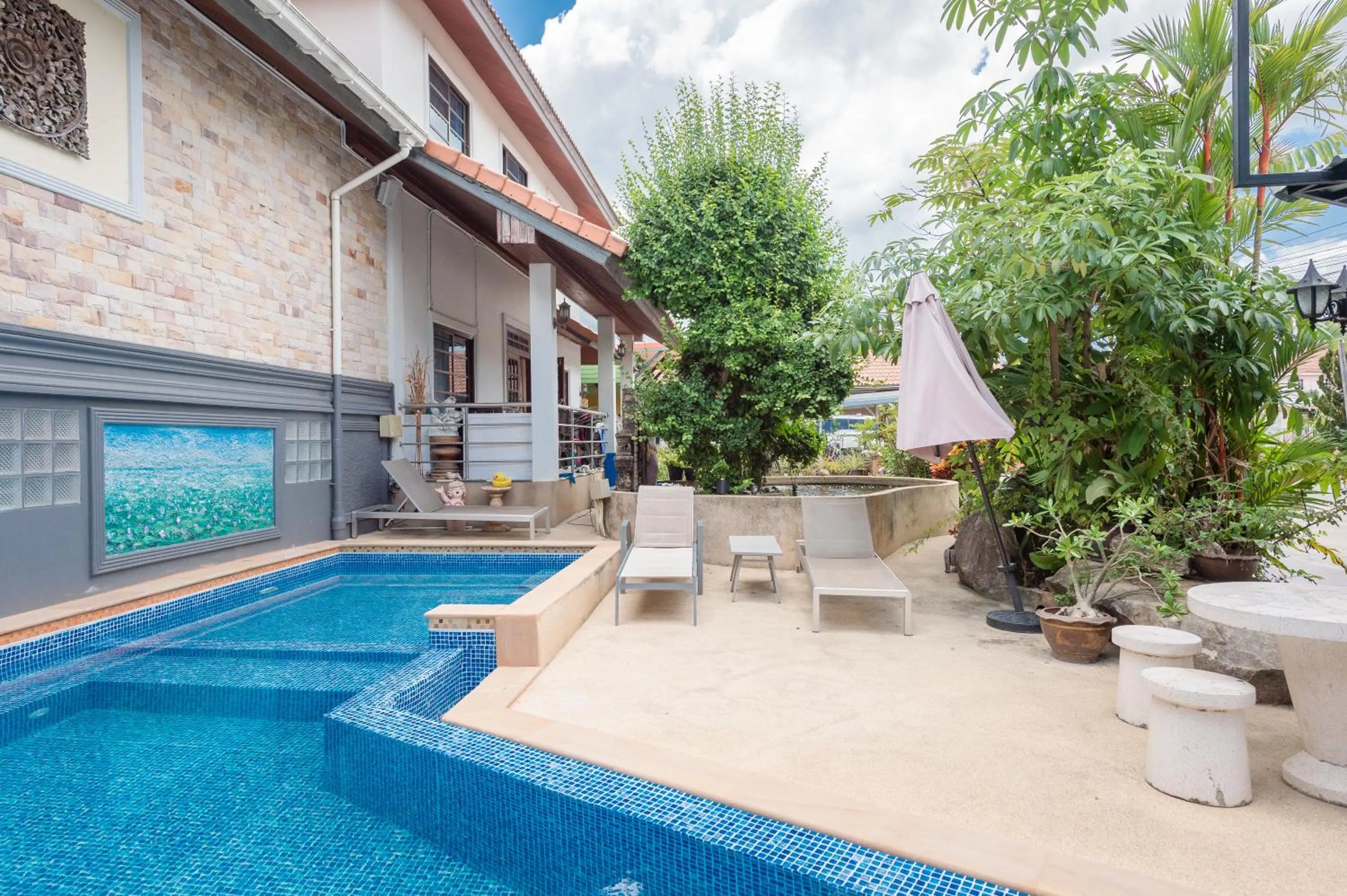 Swimming pool in Chayadol Resort - SHA Extra Plus