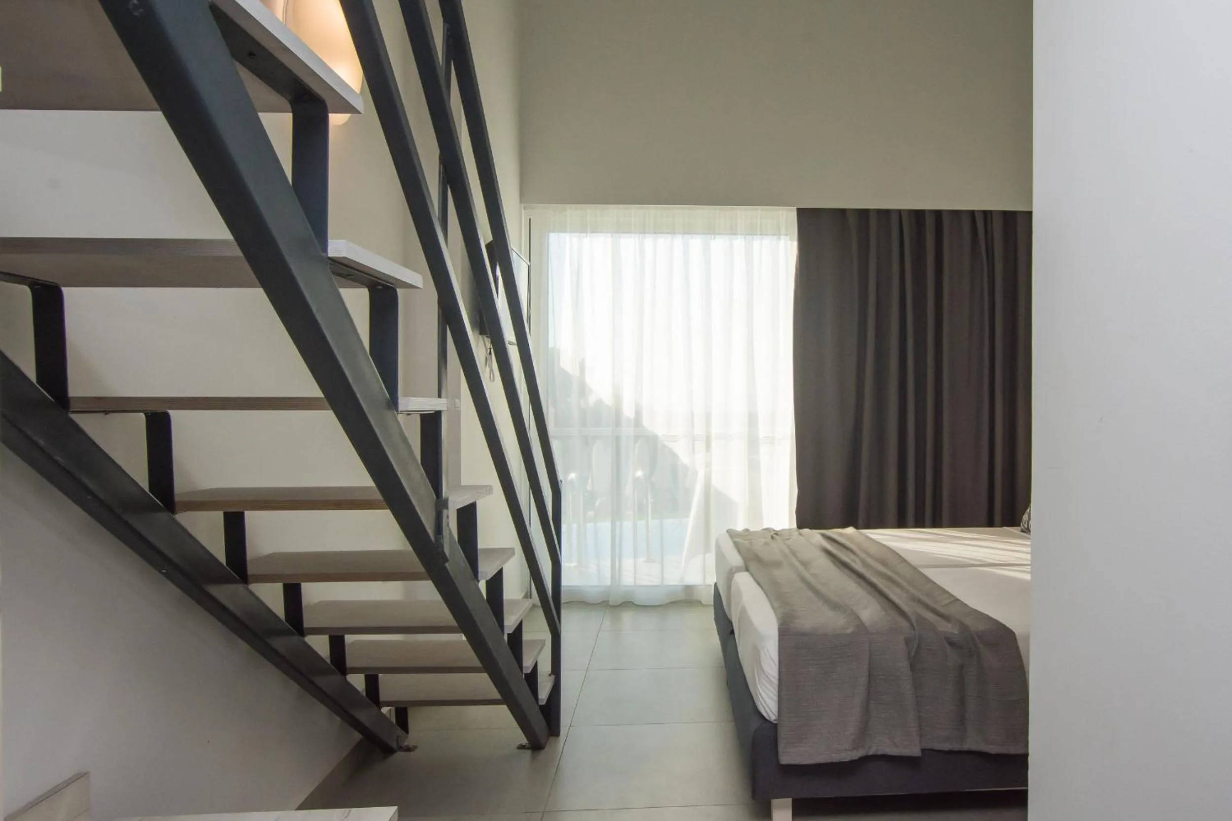 Bedroom, Bed in Golden Coast Beachfront Resort