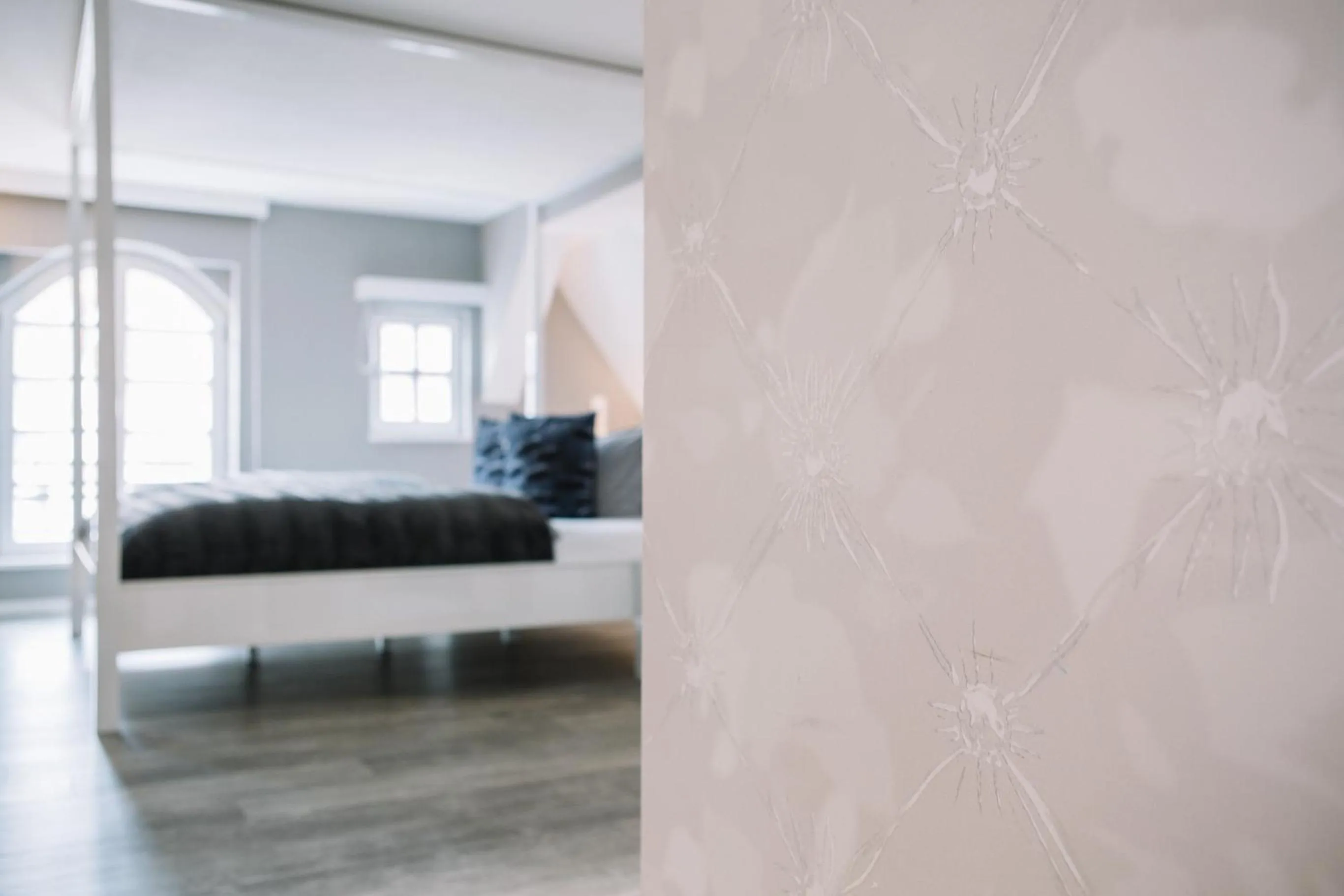 Bed in Boutique Hotel Pfauen