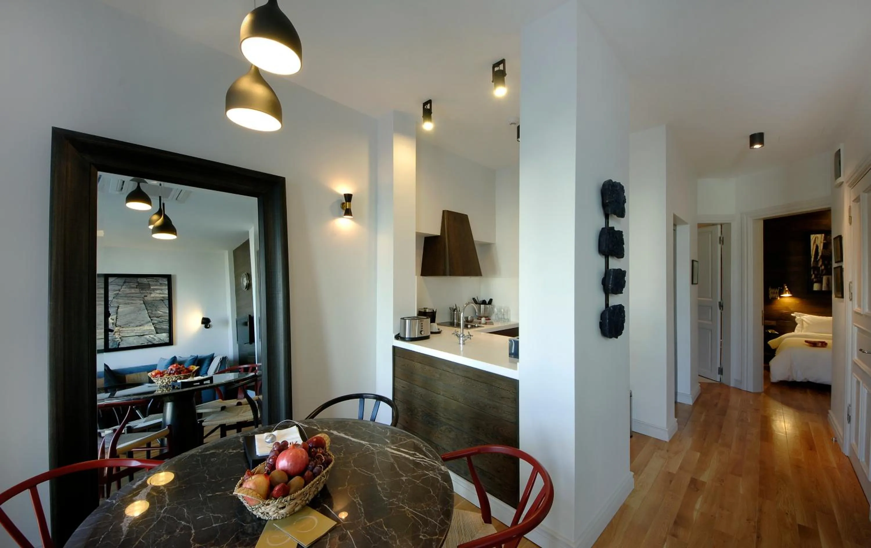 Kitchen or kitchenette, Bed in Urban Suites