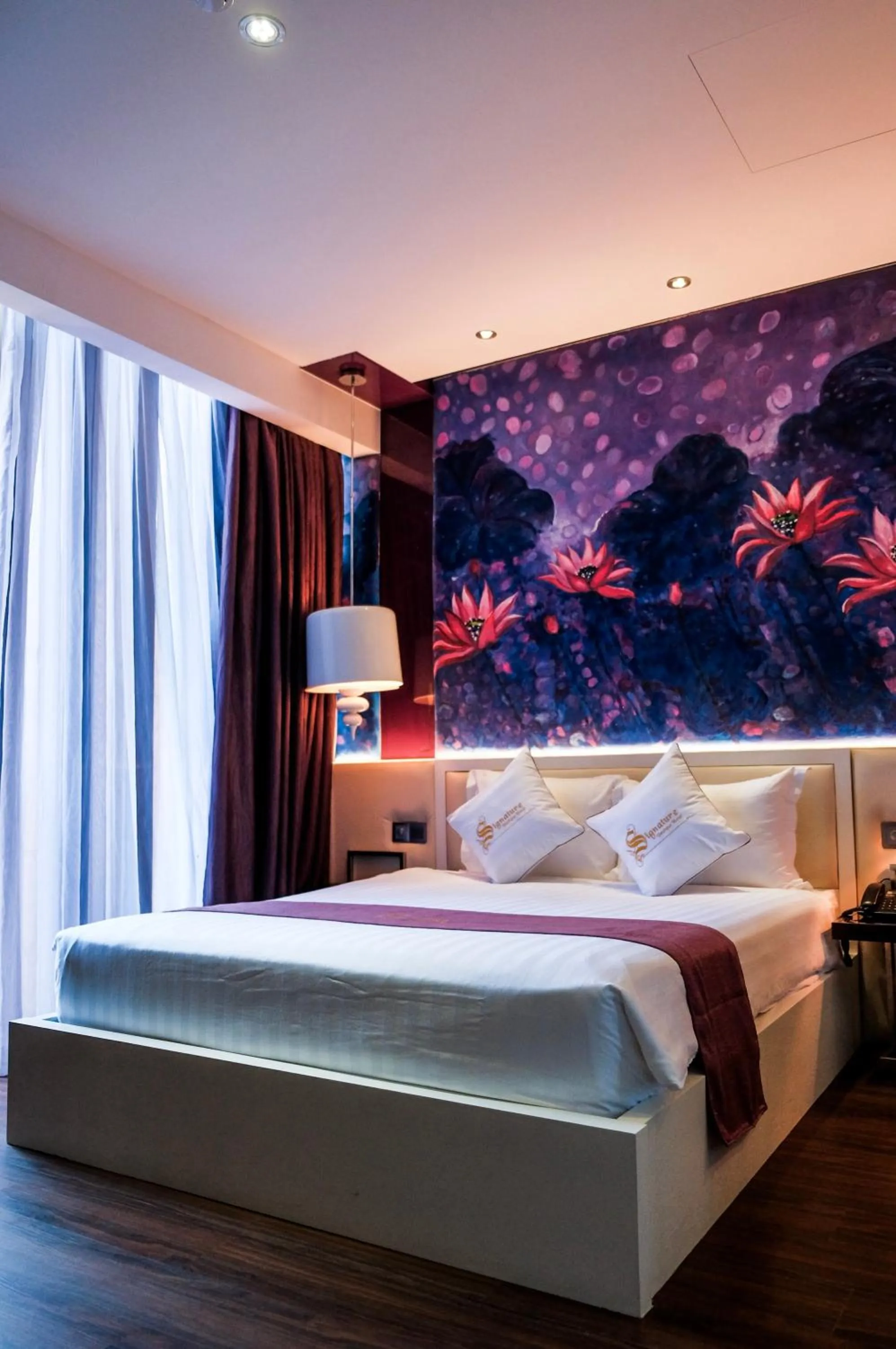 Bed in Signature Boutique Hotel