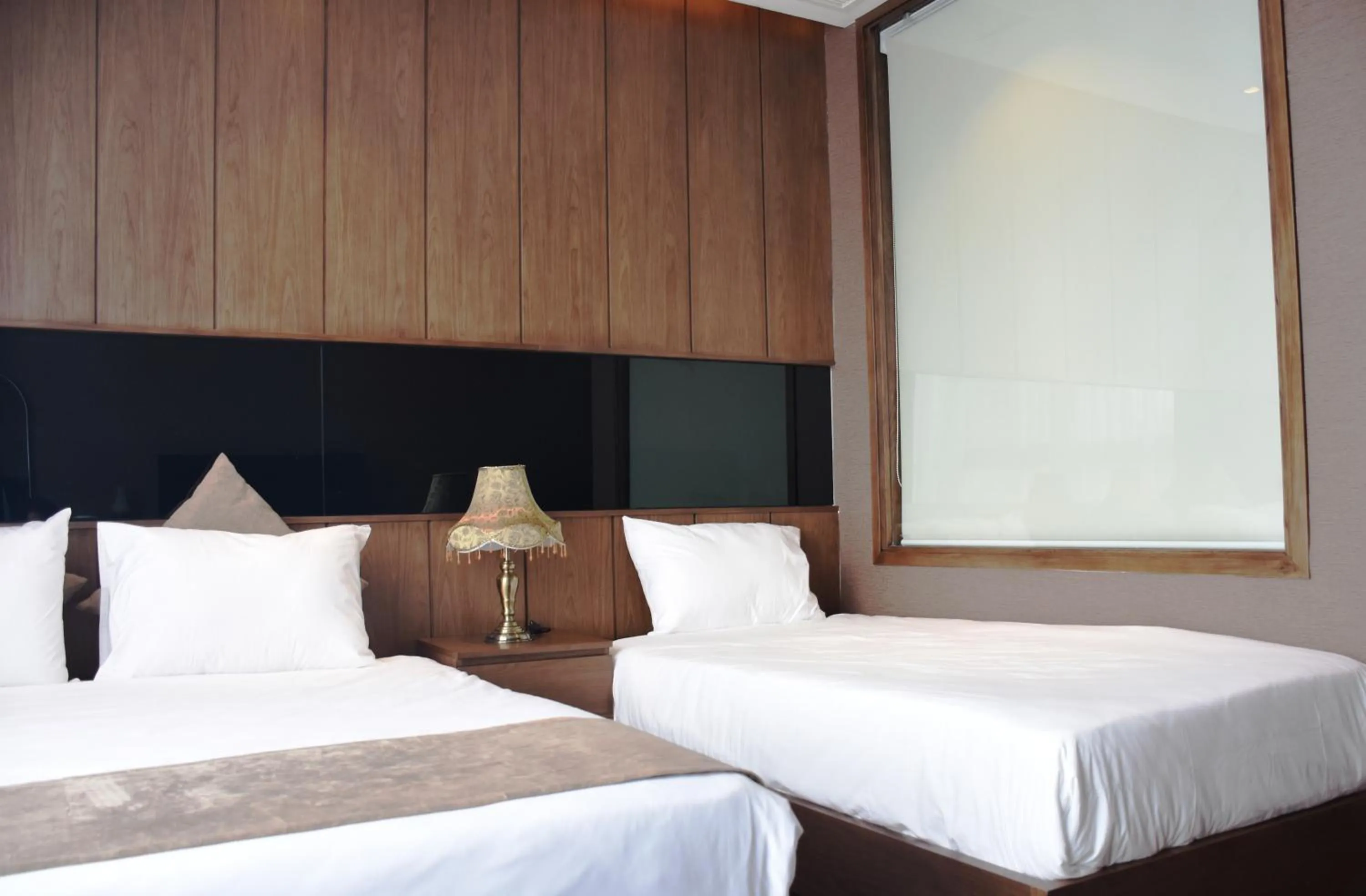 Bed in Signature Boutique Hotel