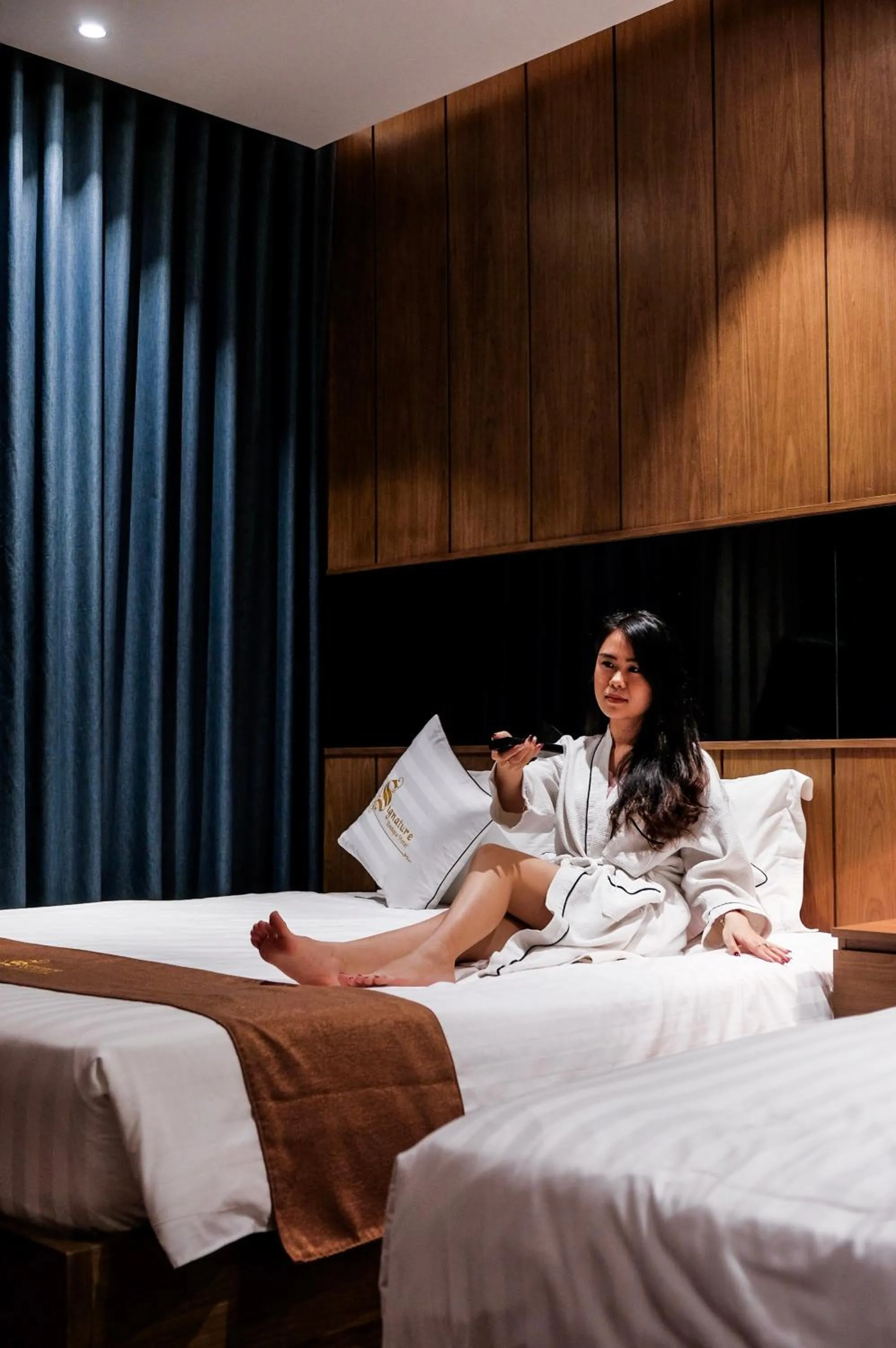 Bed in Signature Boutique Hotel