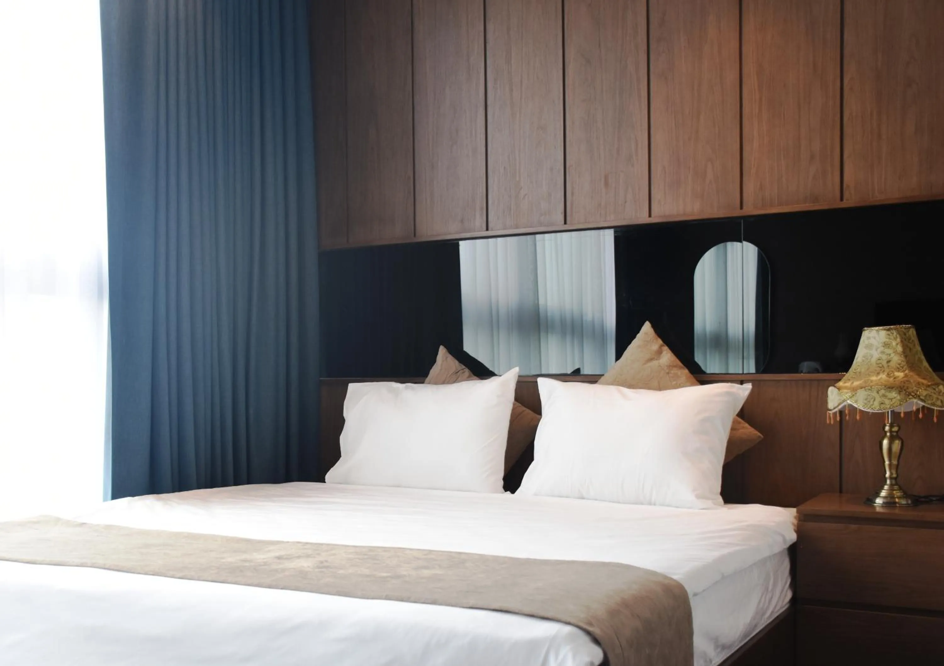 Bed in Signature Boutique Hotel