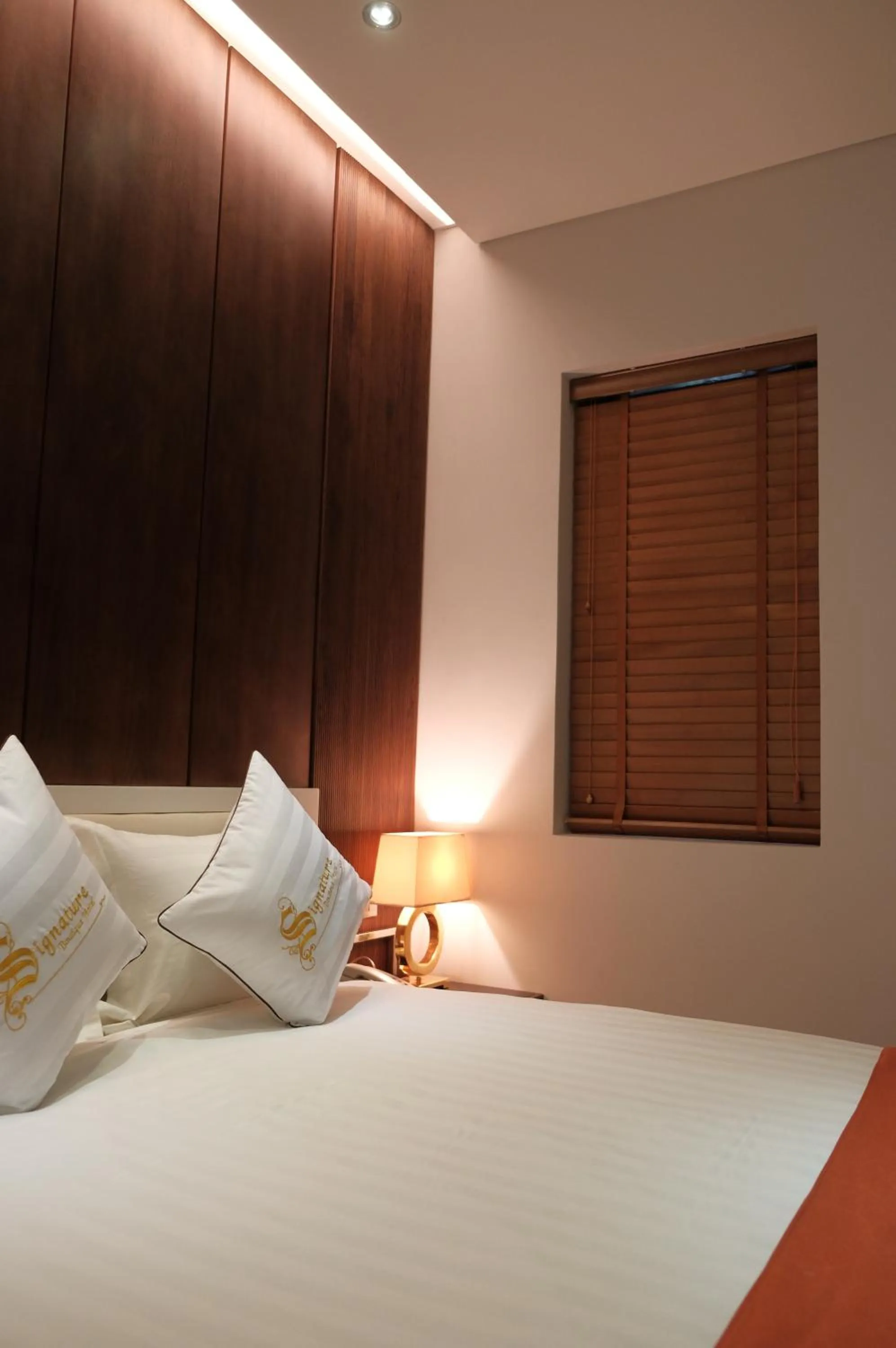 Bed in Signature Boutique Hotel