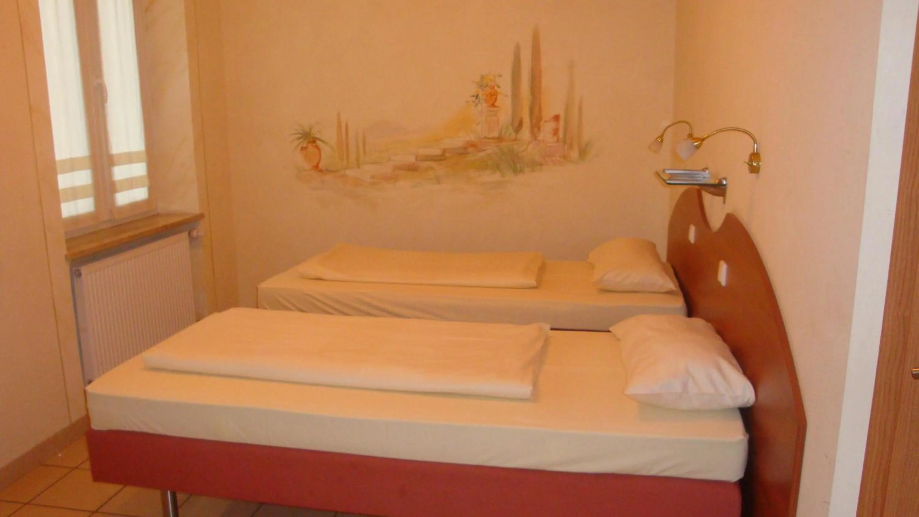 Photo of the whole room, Bed in StadtHotel Passau