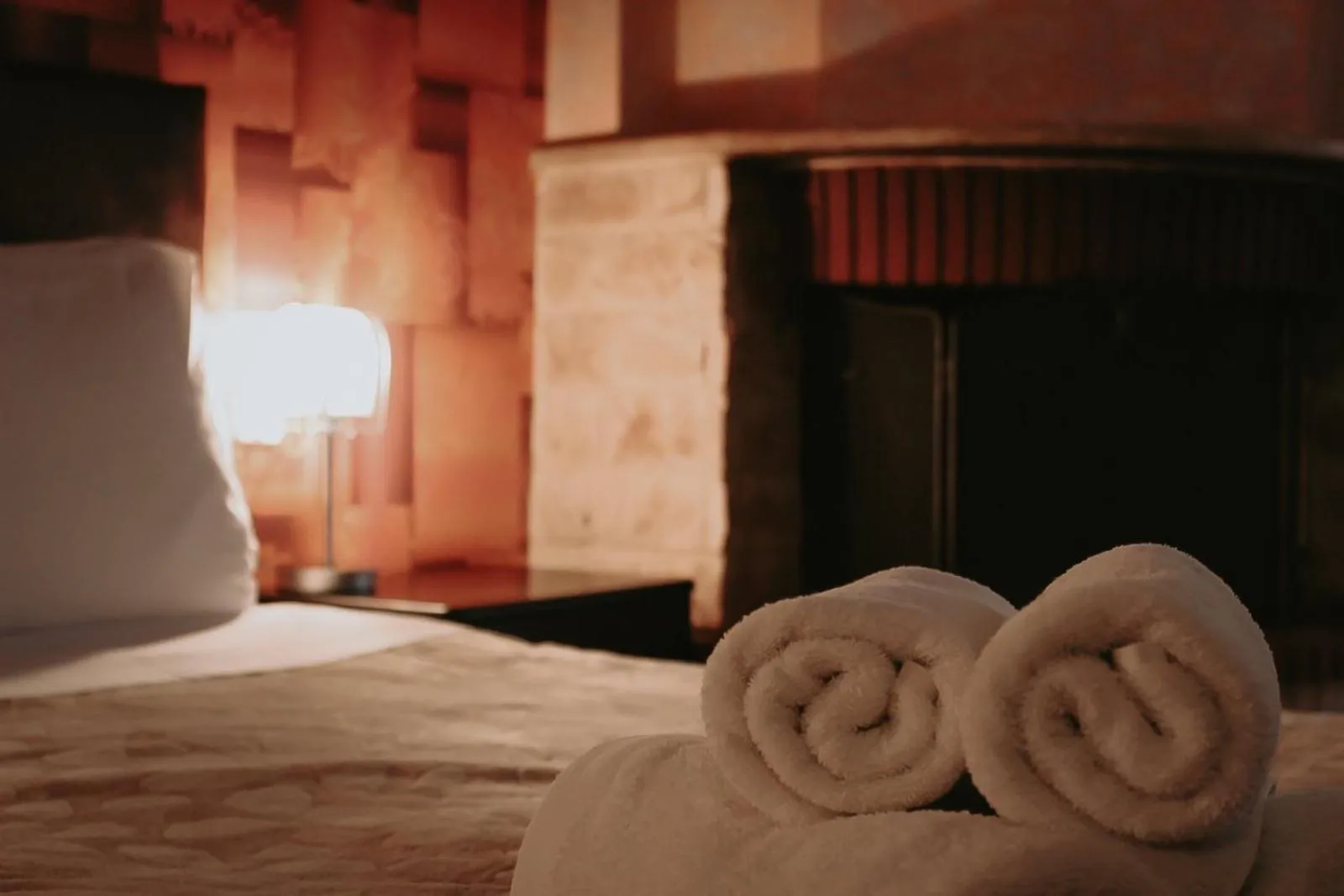 fireplace, Bed in Enastron Hotel