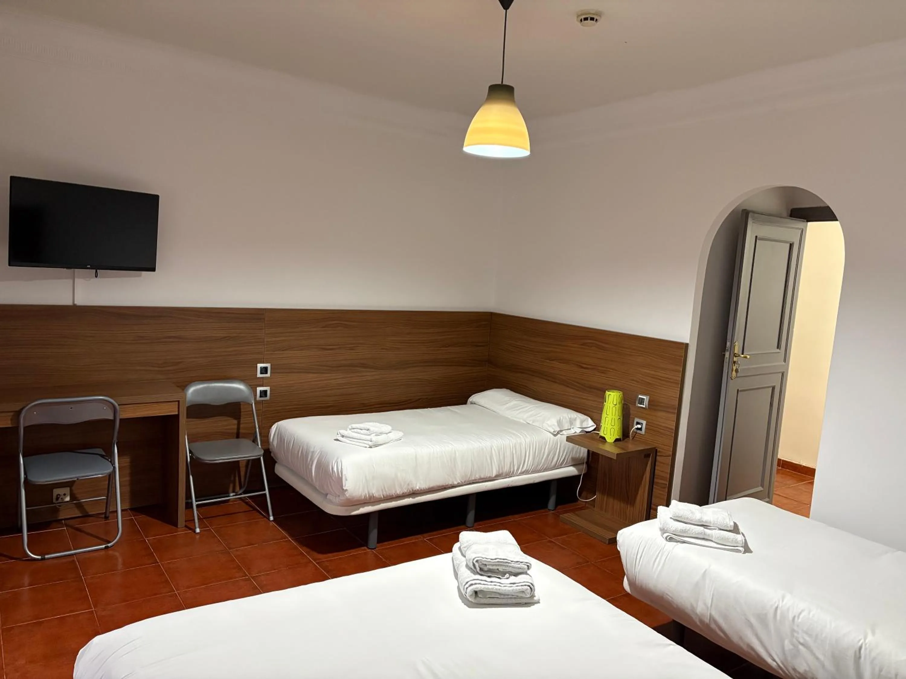 Photo of the whole room, Bed in Hostal La Estación
