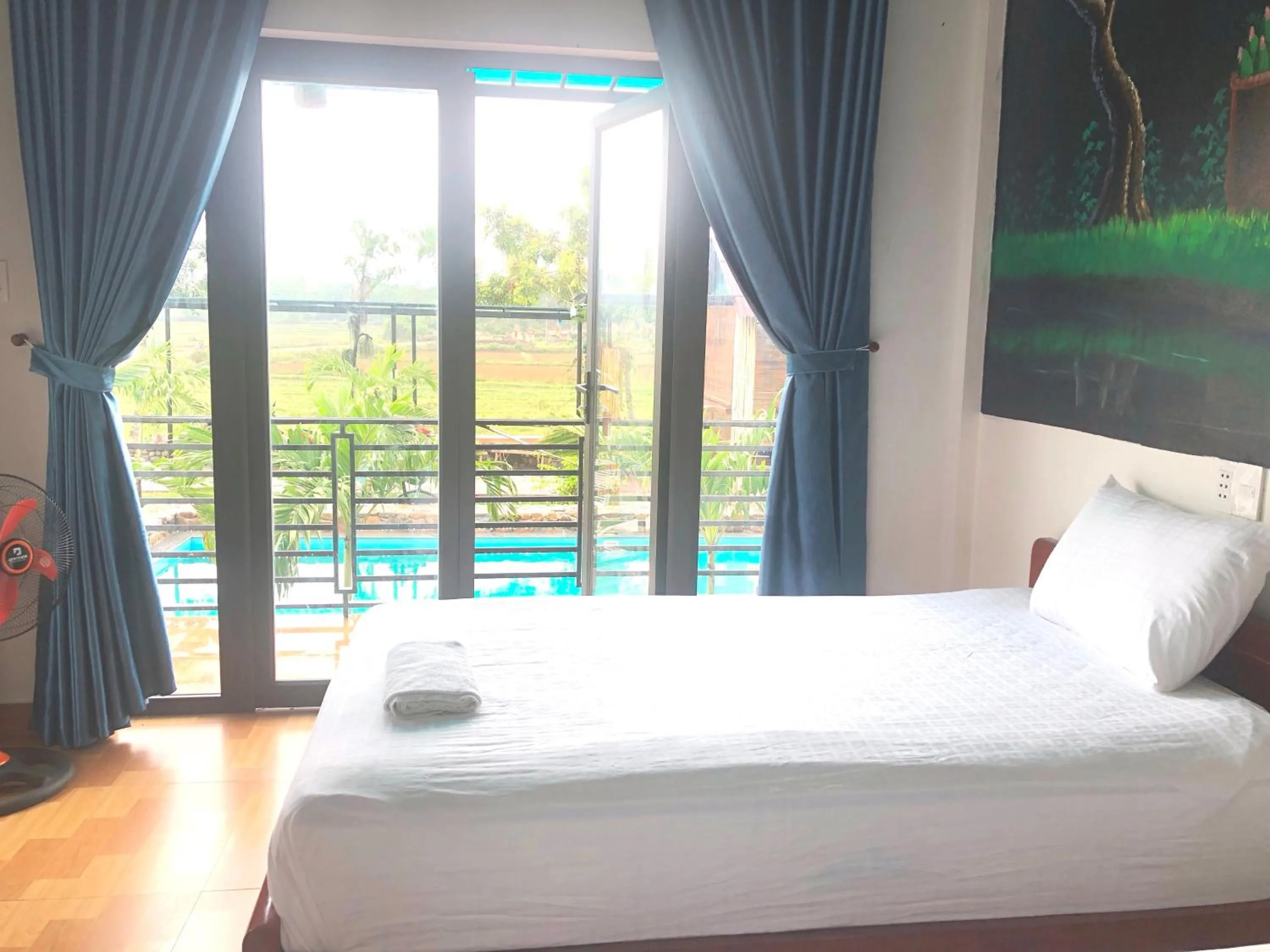 Bed in Palafita Bungalow