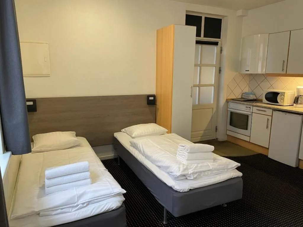 Bed in Hotel Aarhus City Apartments