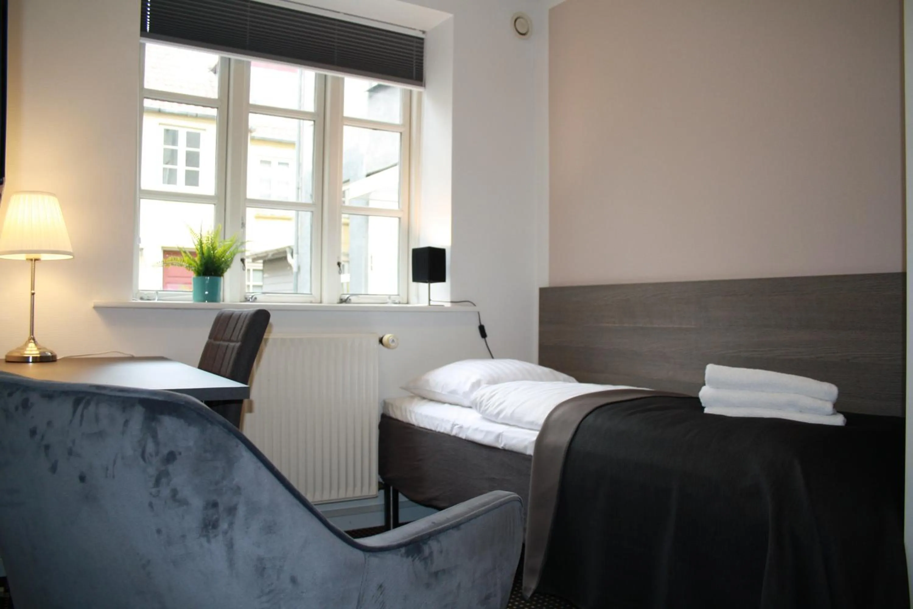 Bed in Hotel Aarhus City Apartments