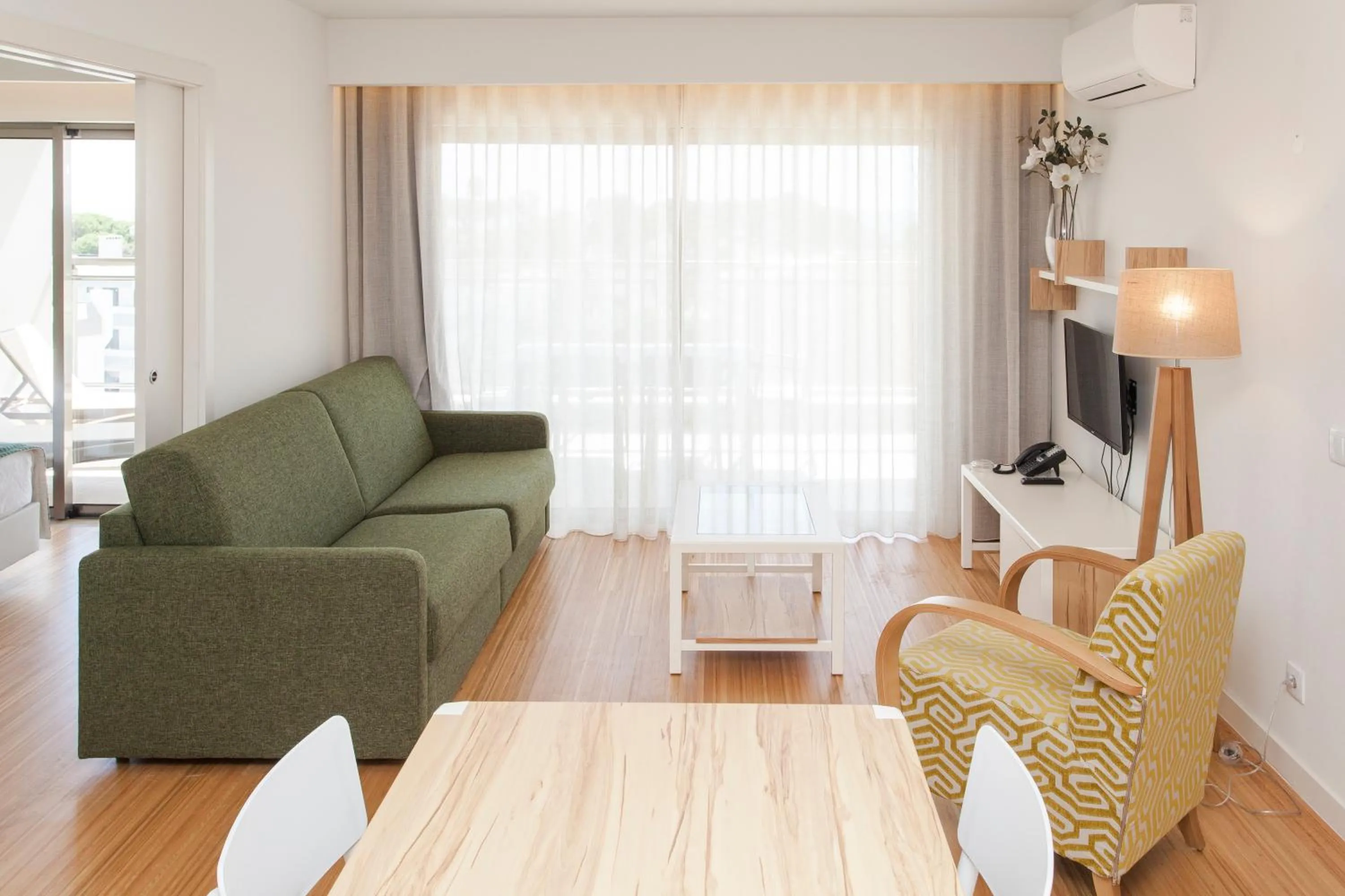 Living room in Alfagar Aparthotel