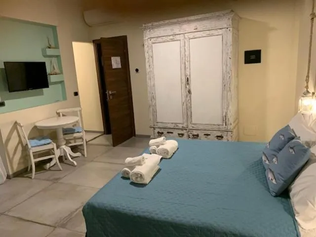 Photo of the whole room, Bed in L'Antico Borgo Elena Noli