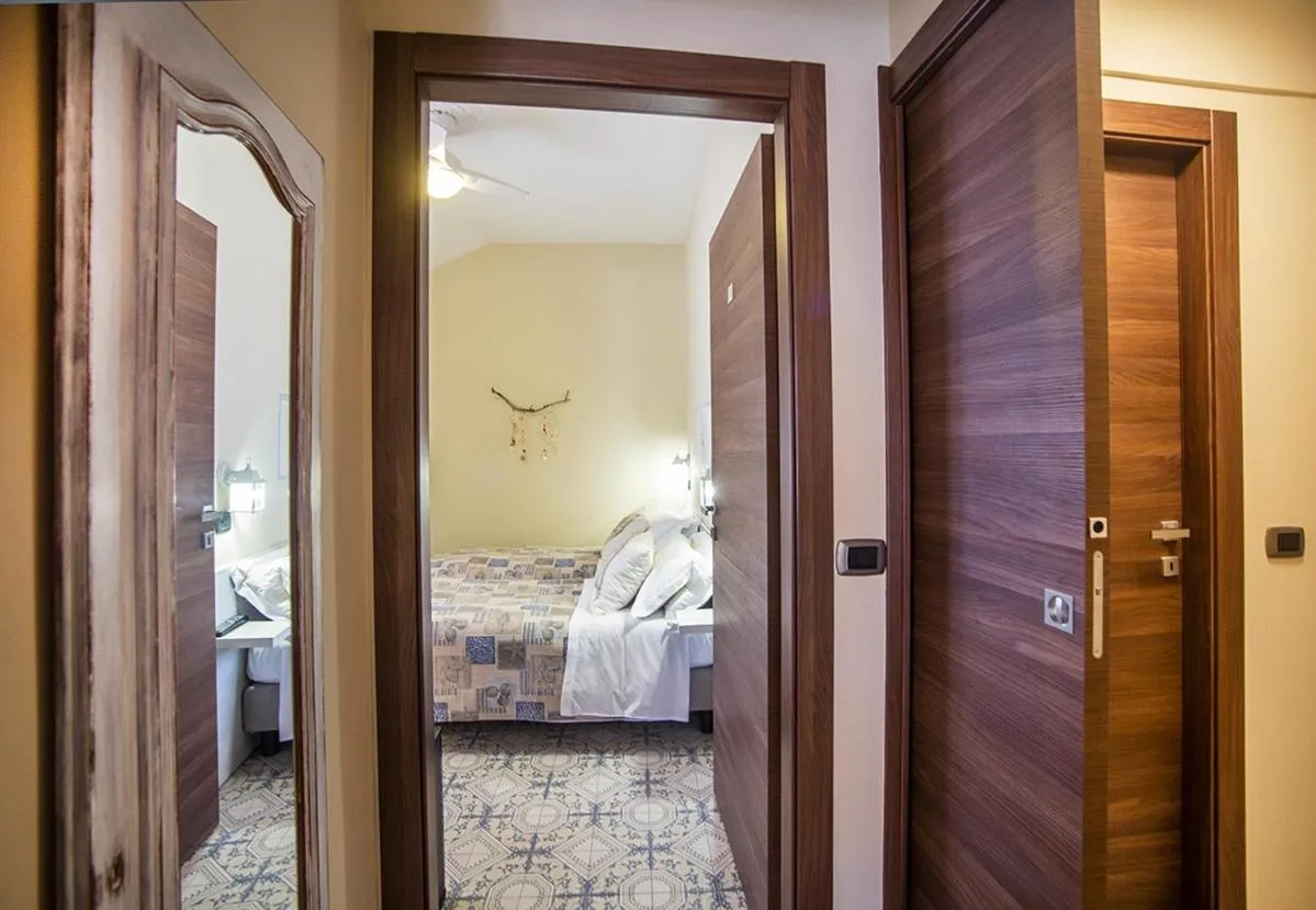 Photo of the whole room, Bed in L'Antico Borgo Elena Noli