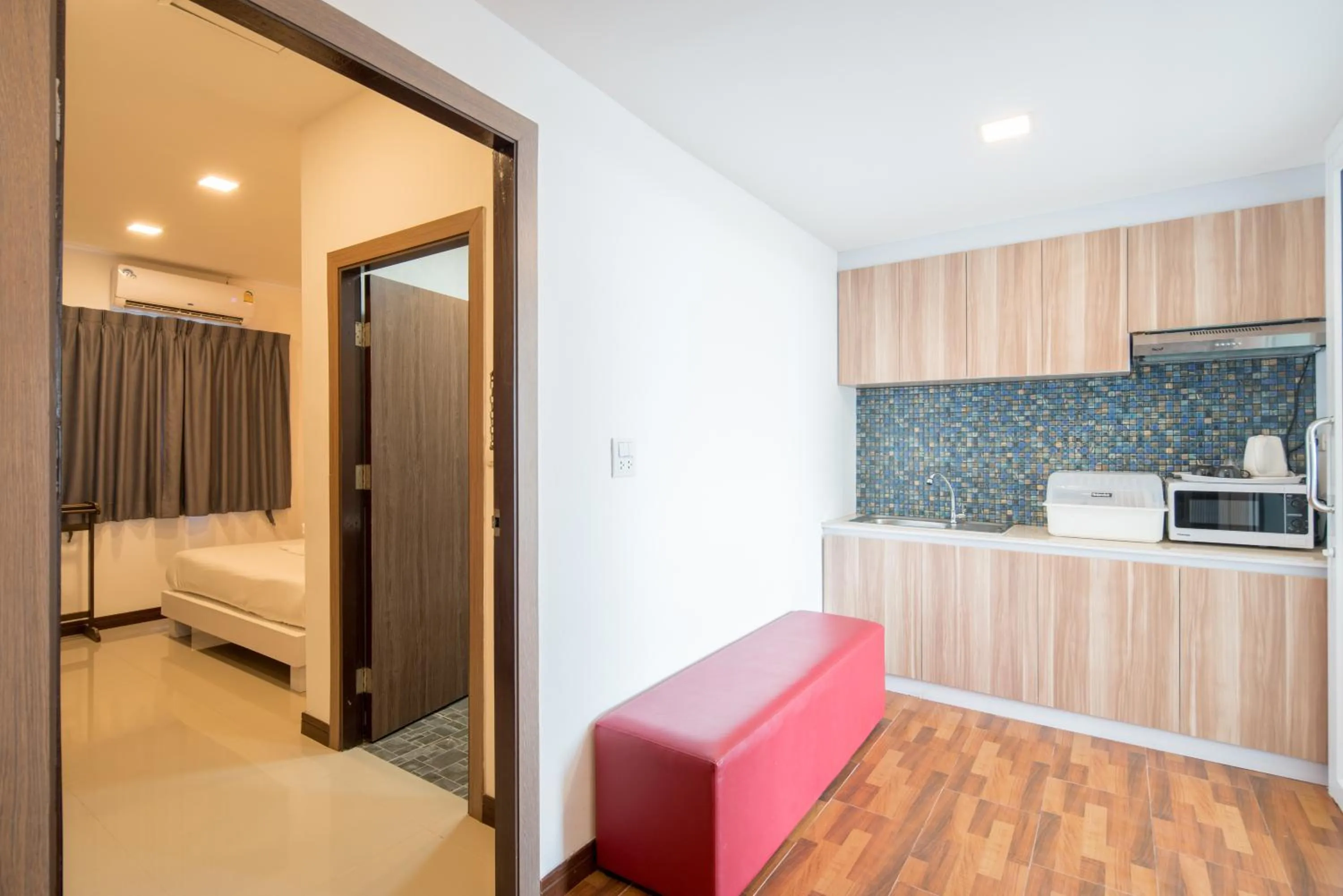 Kitchen or kitchenette, Bed in Baan Thai Beach Side Residence, Patong Beach
