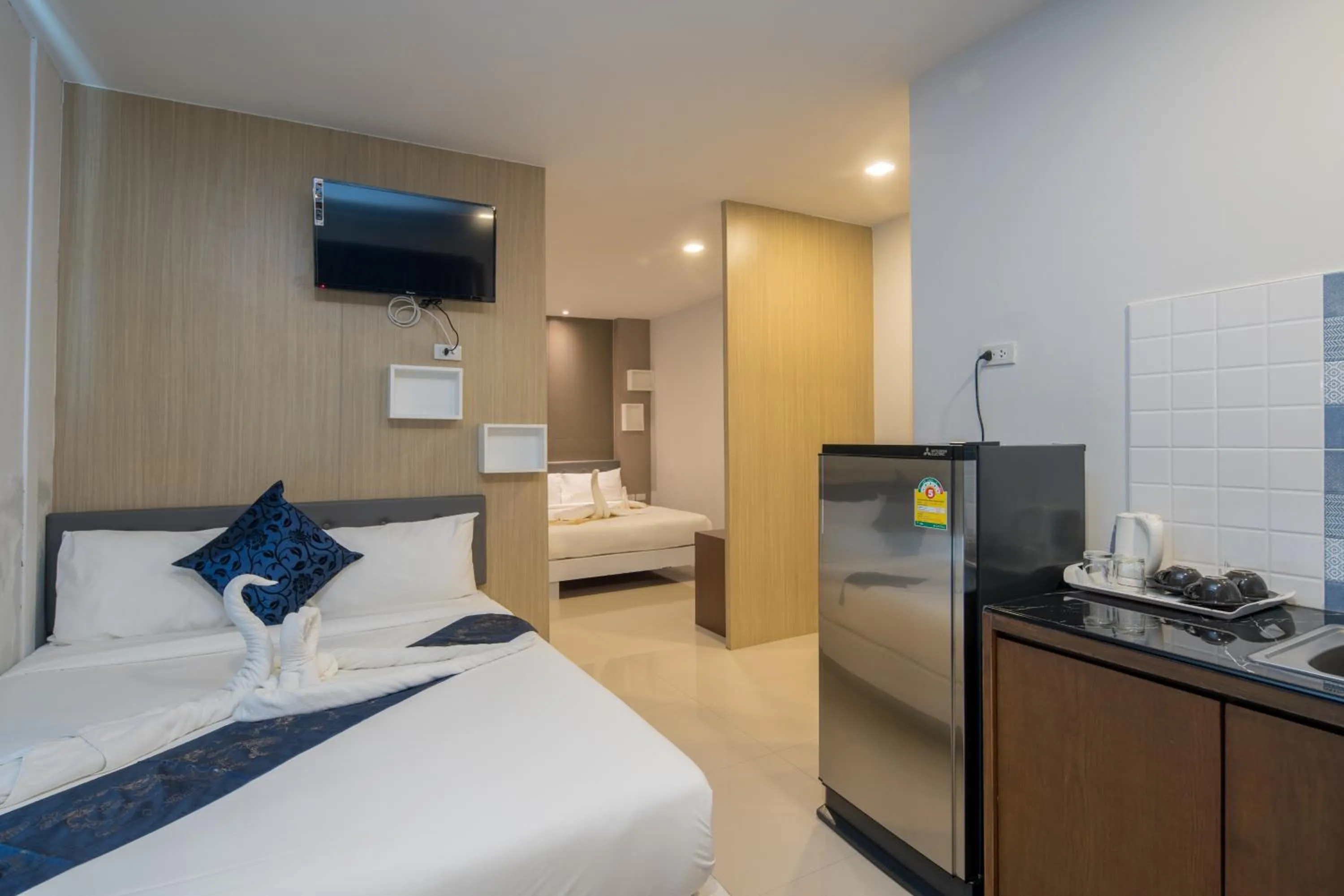 Kitchen or kitchenette, Bed in Baan Thai Beach Side Residence, Patong Beach