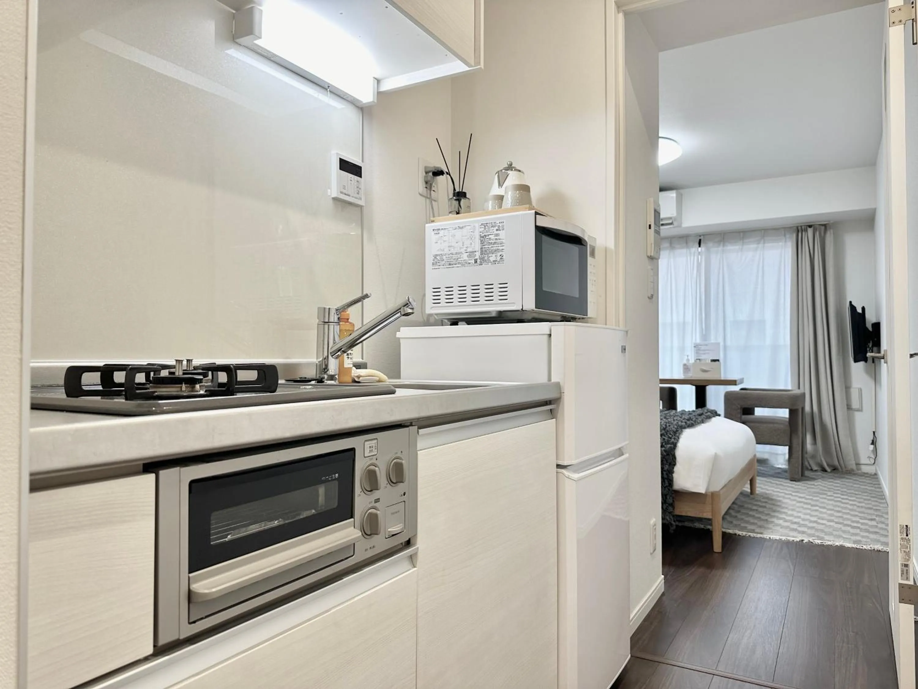 Kitchen or kitchenette, Bed in LANG Hotel GINZA 1K