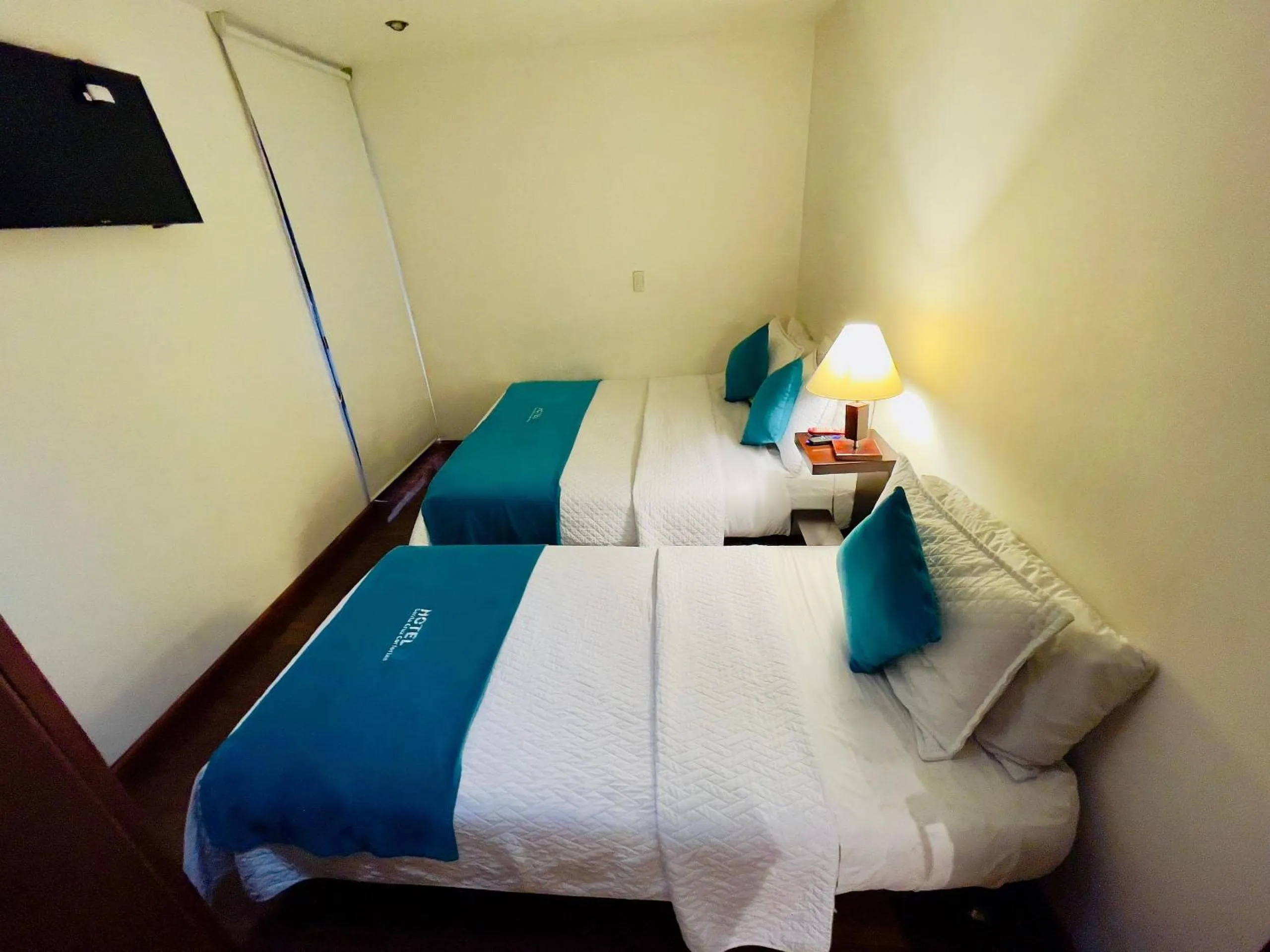 Bedroom, Bed in Hotel Santa Cruz Bogotá