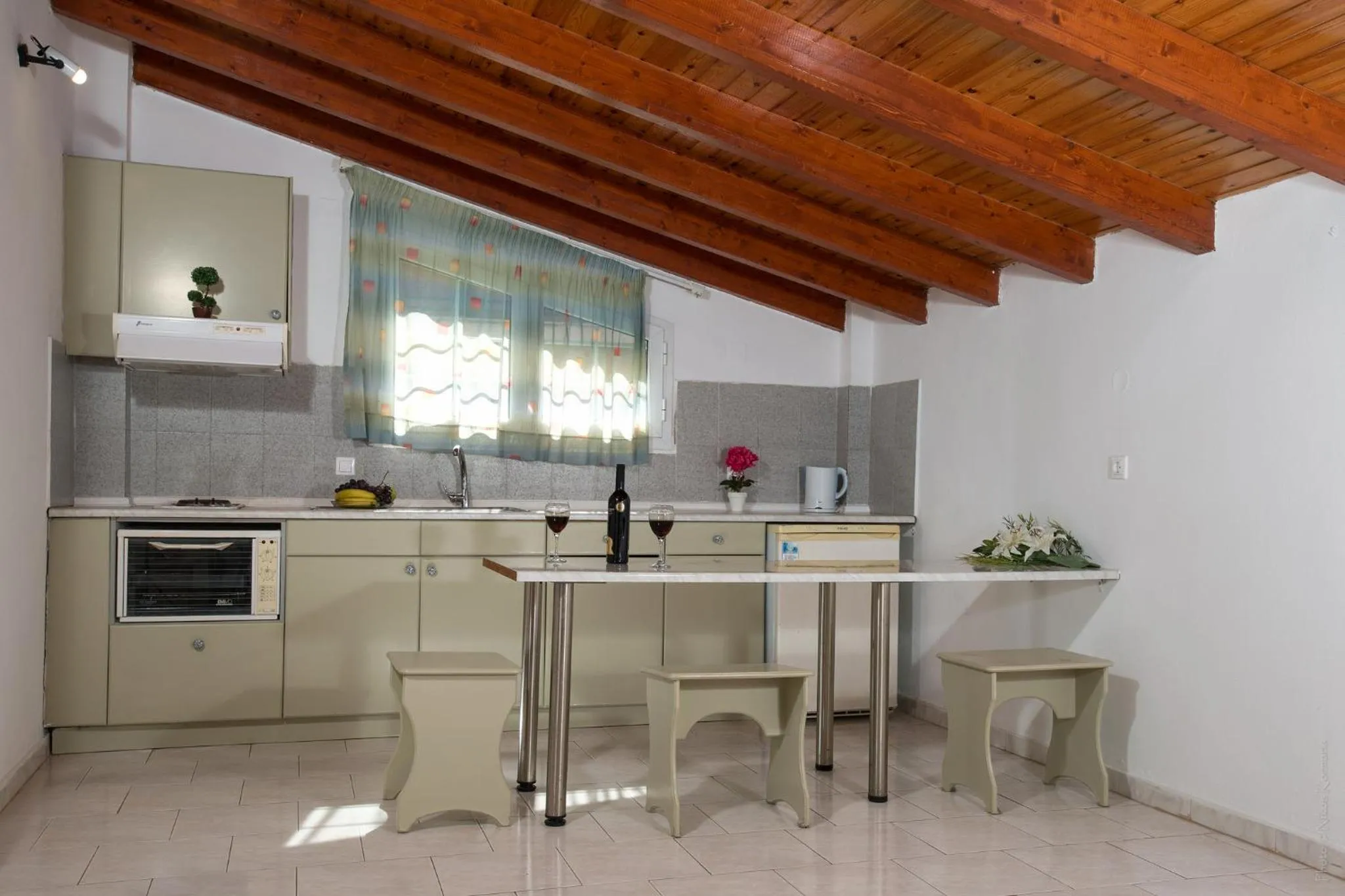 Kitchen or kitchenette in Philippos Hotel