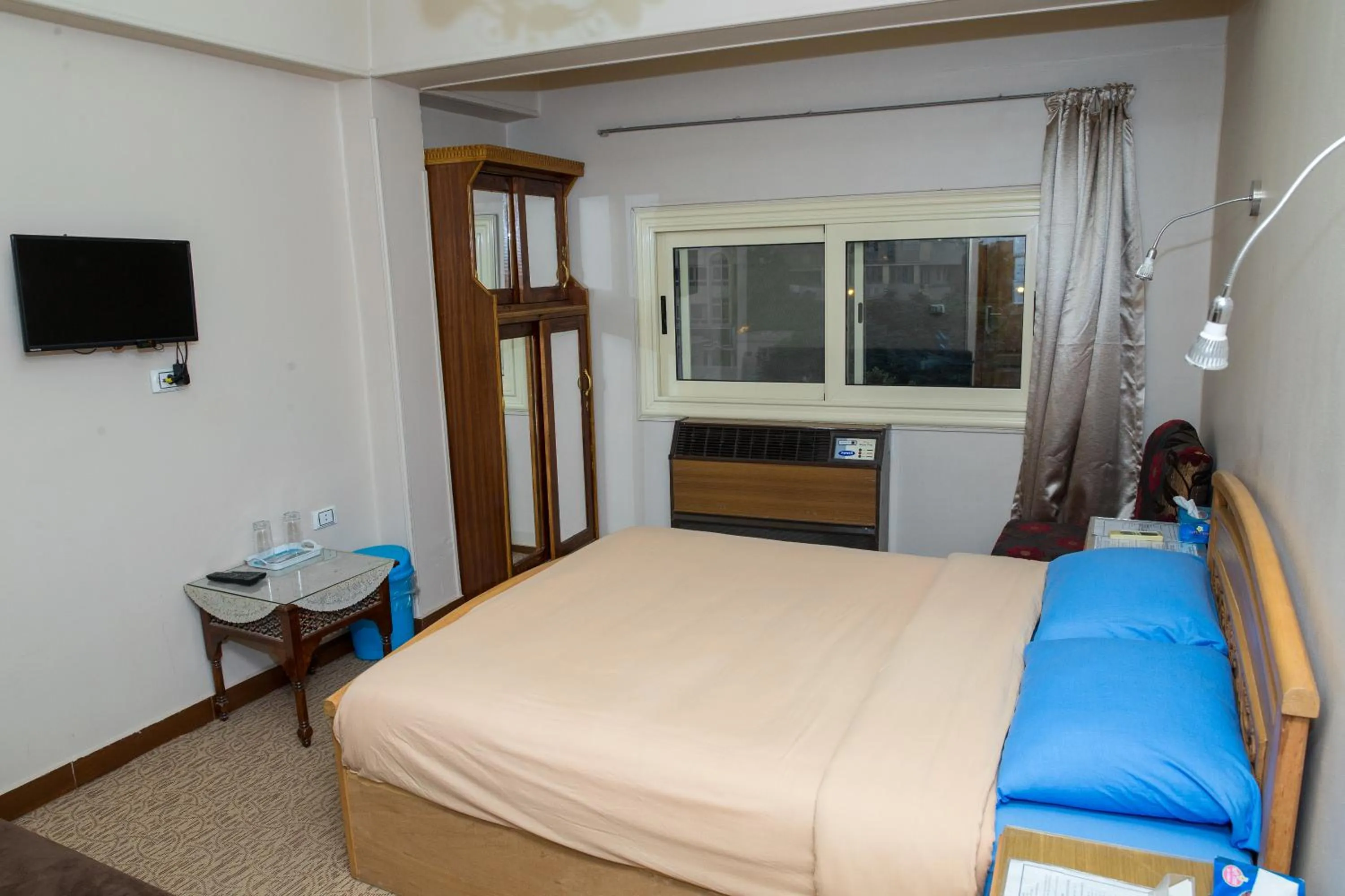 Photo of the whole room, Bed in Guardian Guest House