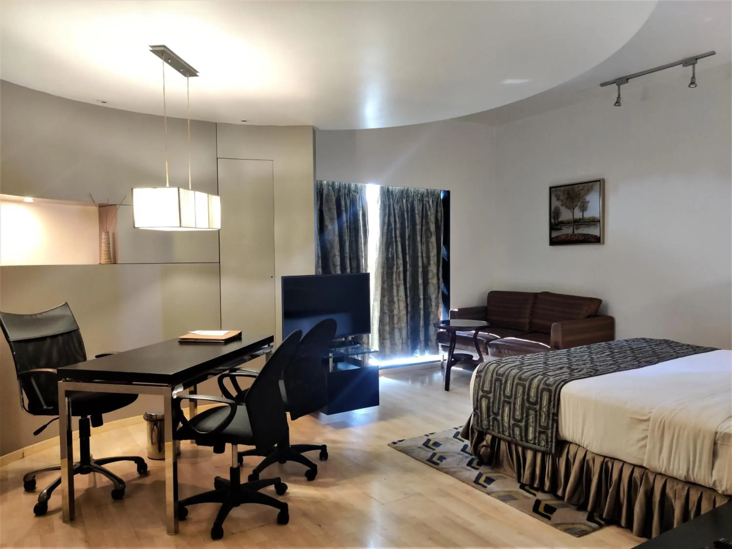 Deluxe Family Room in Hotel Satkar Residency Deluxe Family Room in Hotel Satkar Residency