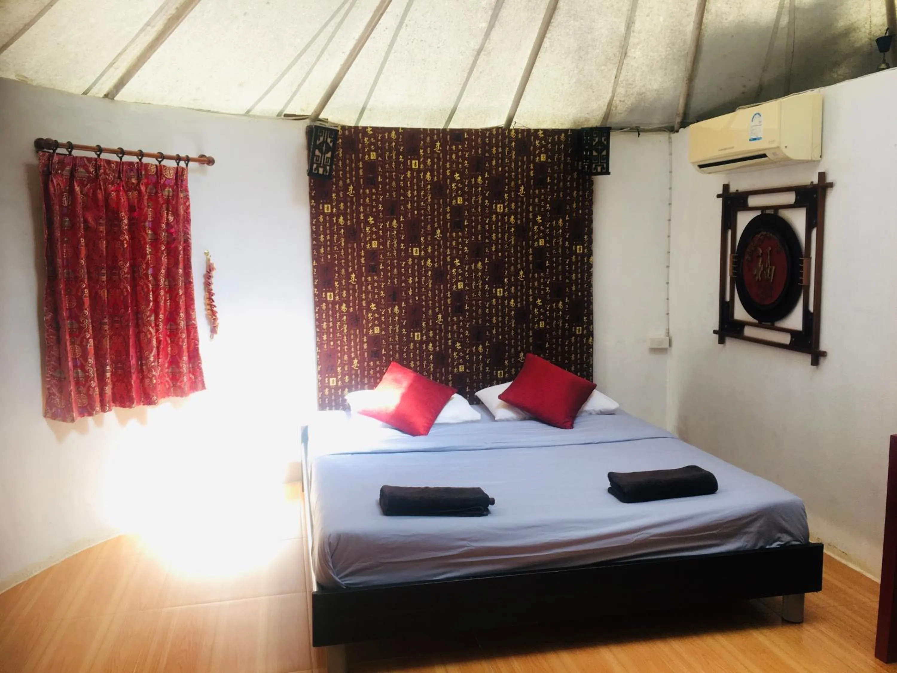 Bed in The Natural Yurt Resort @ Khao Kho