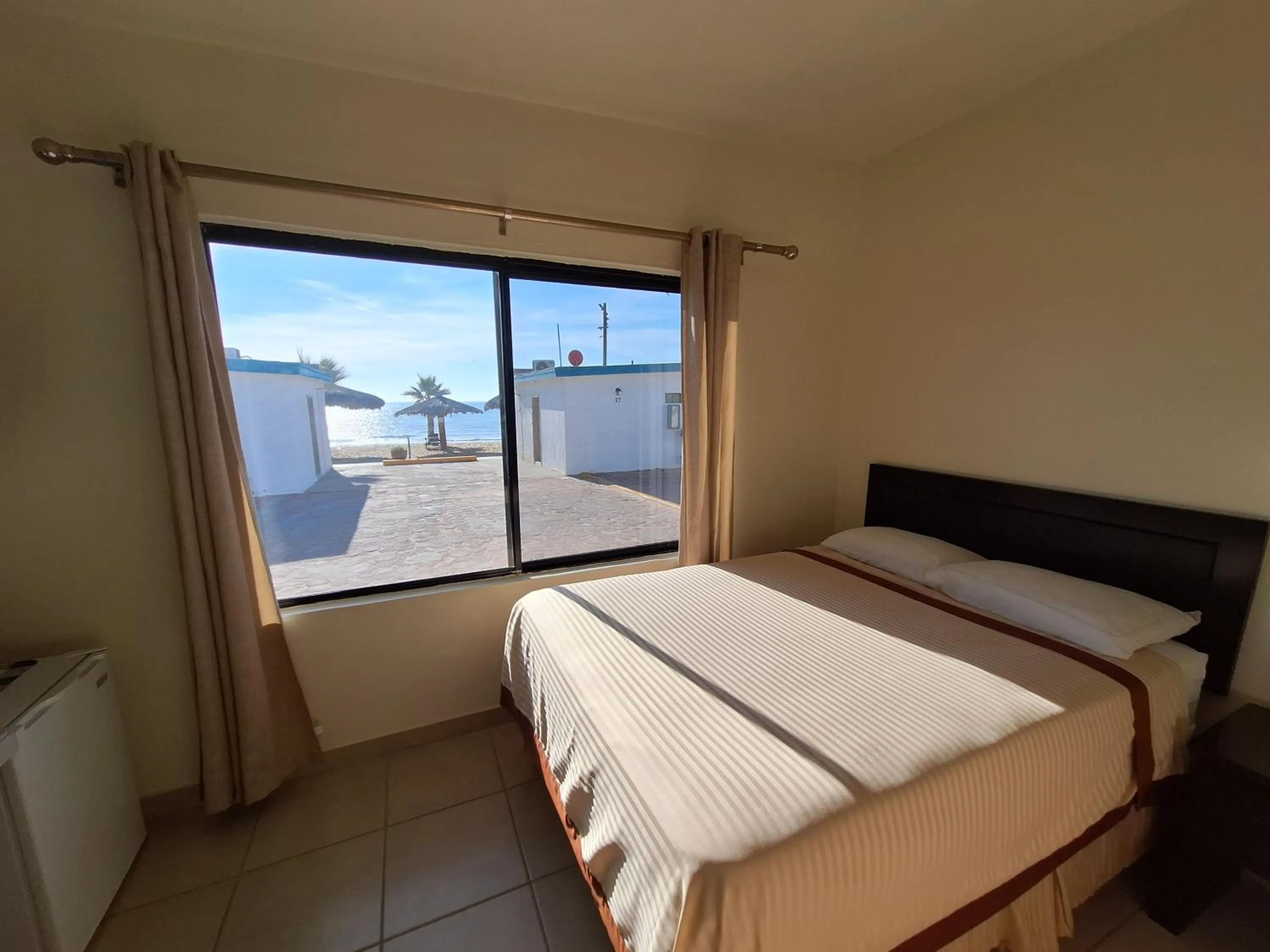 Bed in #53 Bungalow Seaside Hotel & Victors RV Park