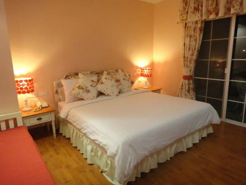 Bed in Kensington English Garden Resort Khaoyai